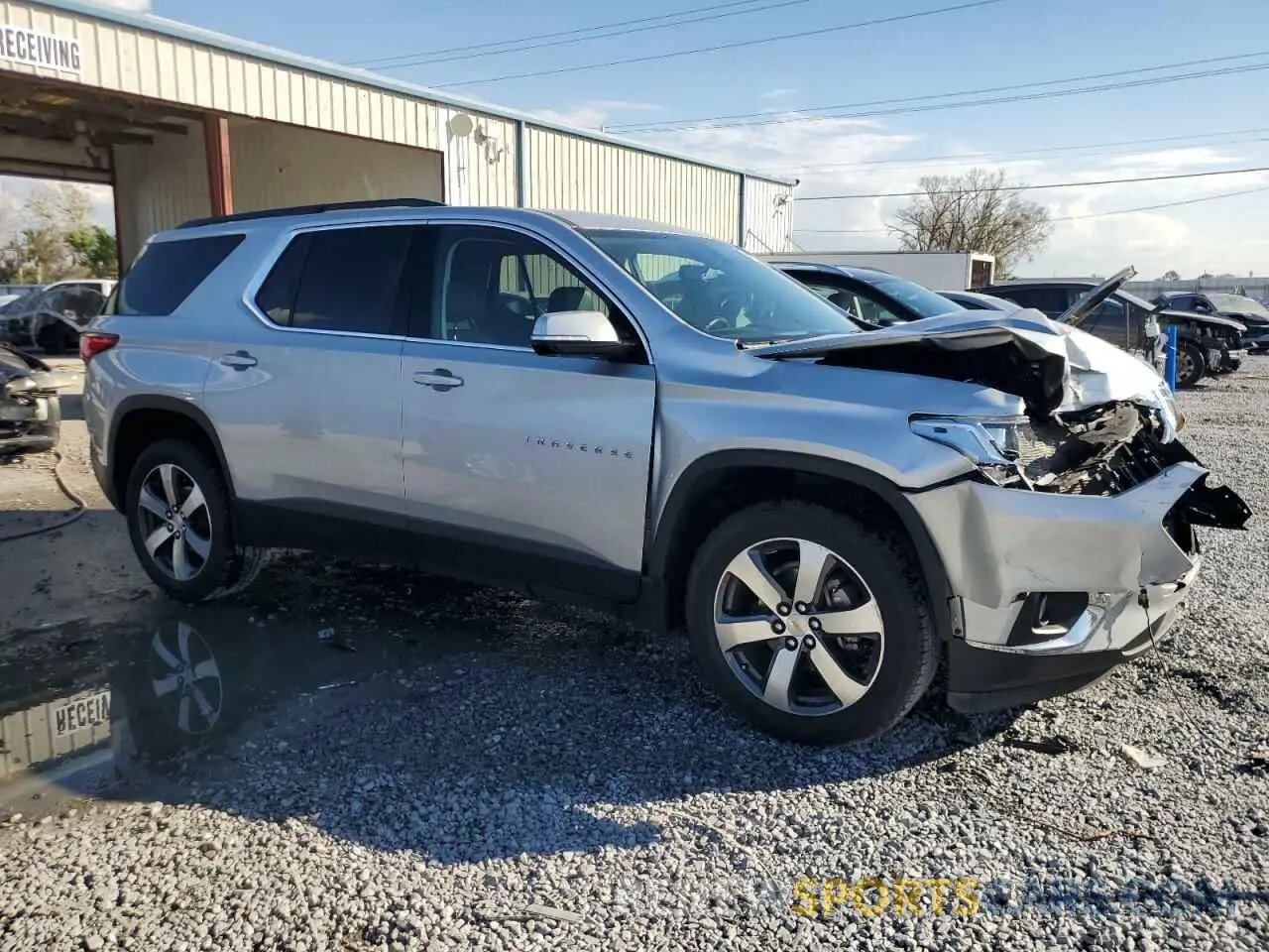 4 Photograph of a damaged car 1GNEVHKW6KJ139481 CHEVROLET TRAVERSE 2019