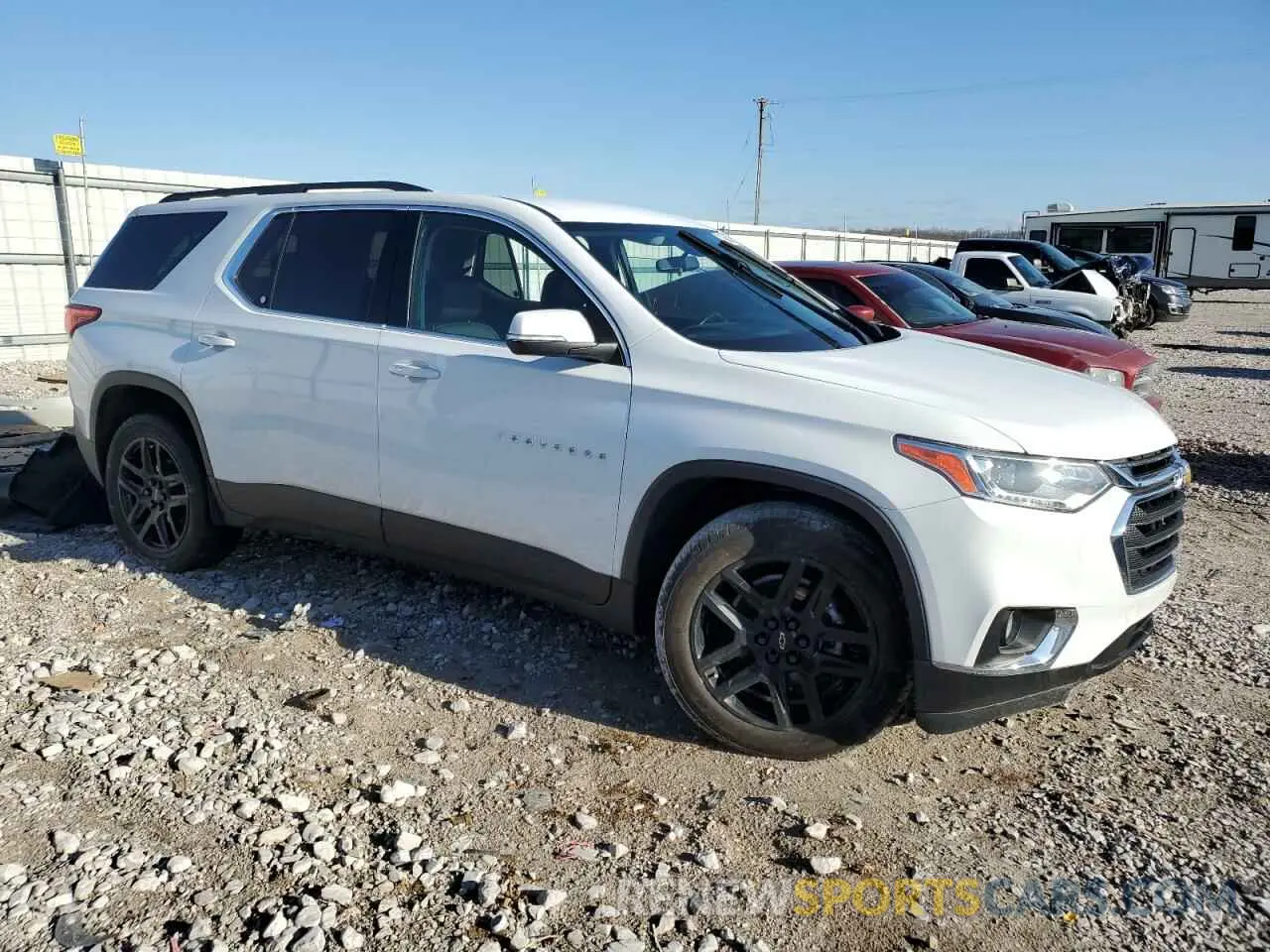 4 Photograph of a damaged car 1GNEVHKW5MJ130239 CHEVROLET TRAVERSE 2021