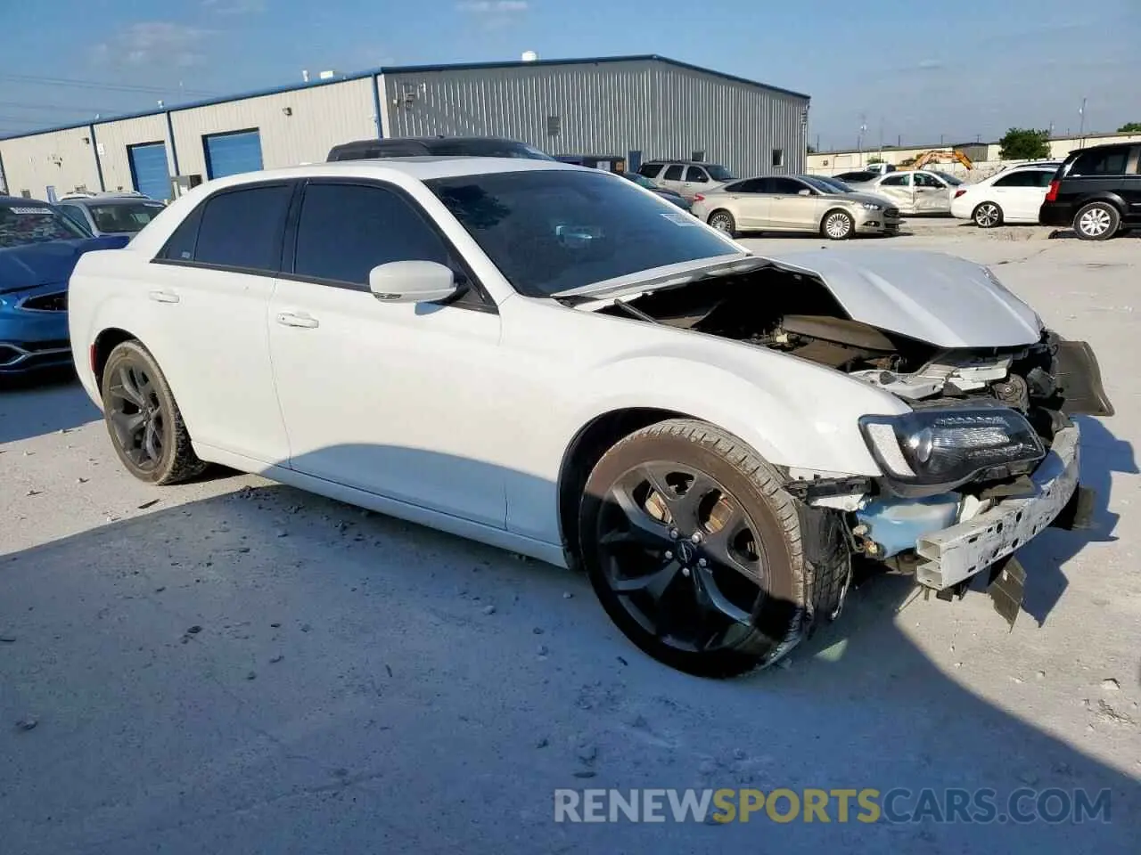 4 Photograph of a damaged car 2C3CCABG0PH613850 CHRYSLER 300 2023