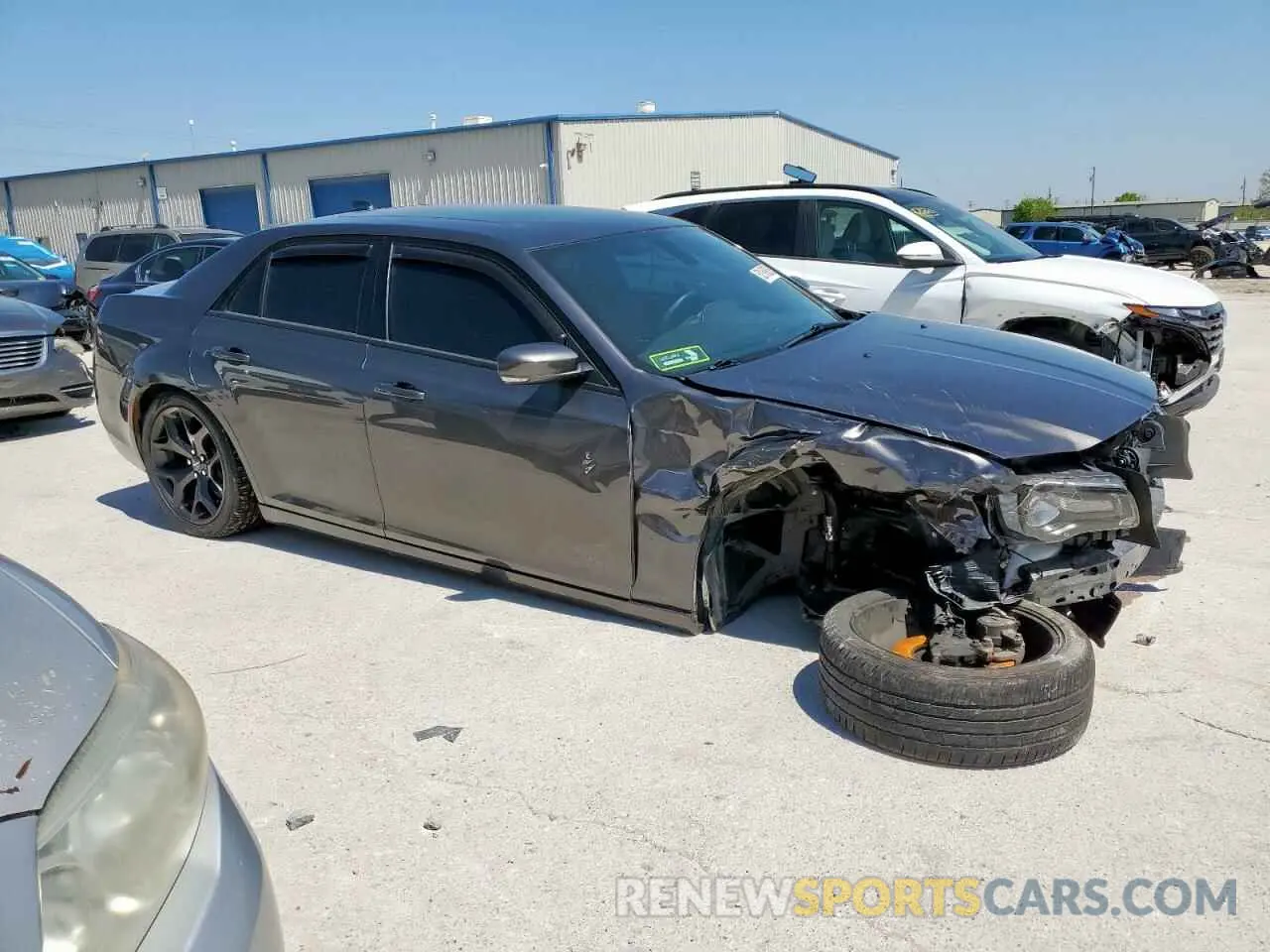 4 Photograph of a damaged car 2C3CCABGXPH706746 CHRYSLER 300 2023