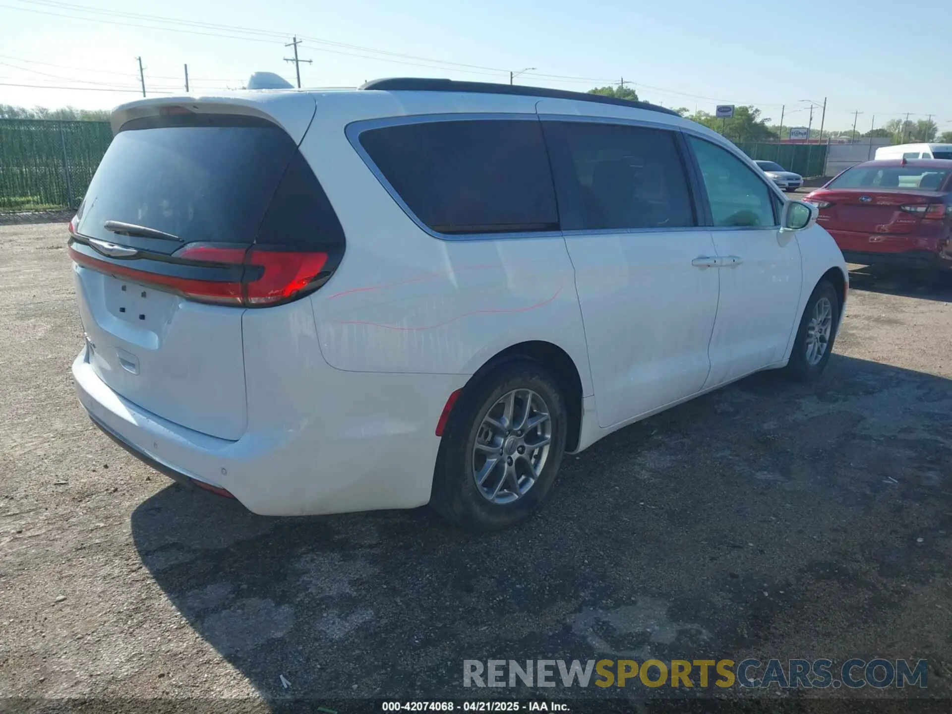 4 Photograph of a damaged car 2C4RC1FG9NR158021 CHRYSLER PACIFICA 2022