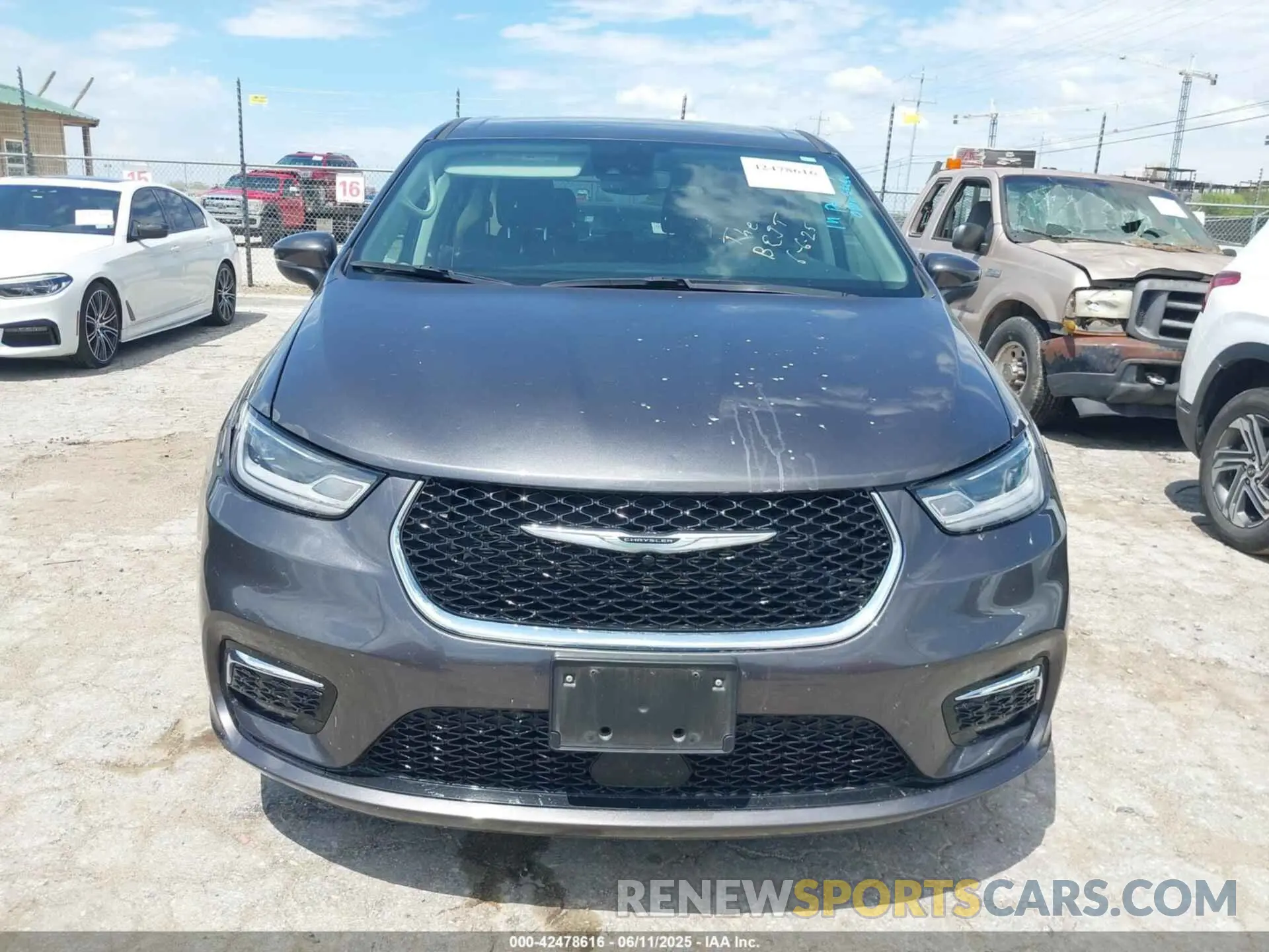 12 Photograph of a damaged car 2C4RC1BG1PR612691 CHRYSLER PACIFICA 2023
