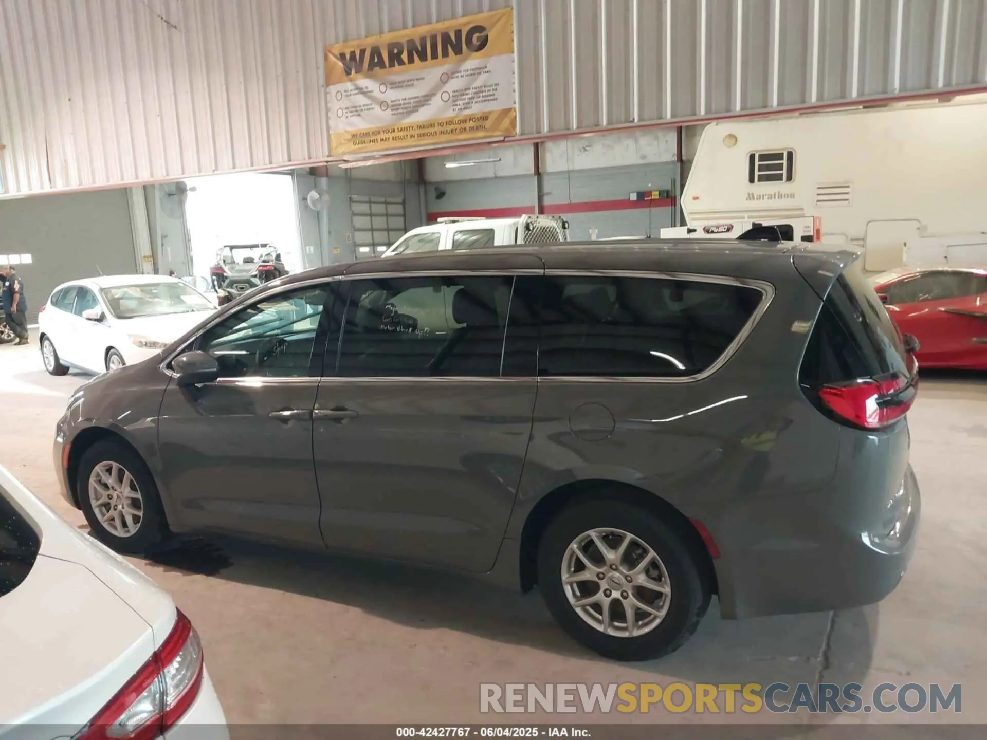 14 Photograph of a damaged car 2C4RC1BG8PR581505 CHRYSLER PACIFICA 2023
