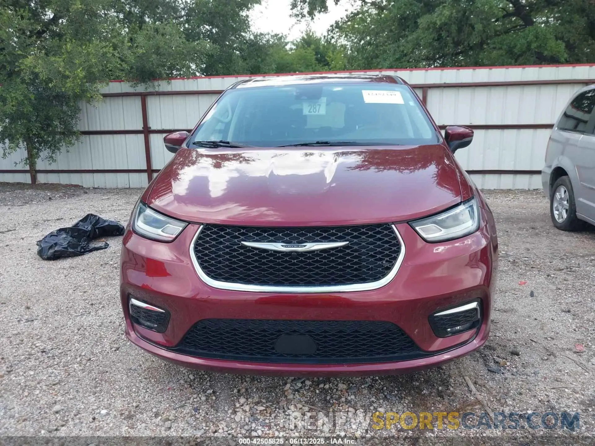 12 Photograph of a damaged car 2C4RC1BGXPR571557 CHRYSLER PACIFICA 2023