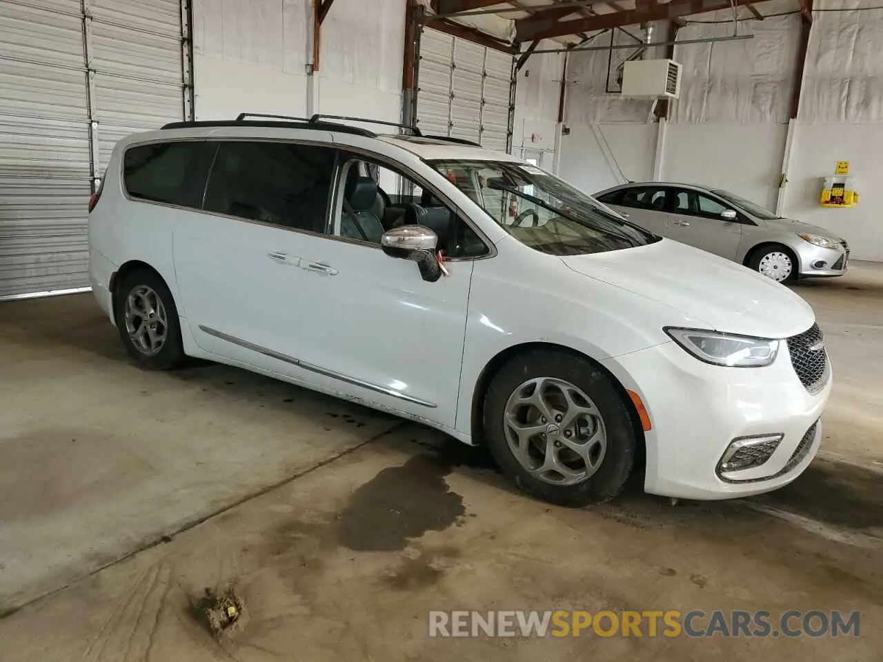 4 Photograph of a damaged car 2C4RC1GG5PR520802 CHRYSLER PACIFICA 2023