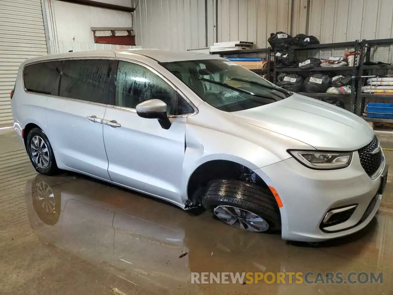 4 Photograph of a damaged car 2C4RC1L79PR618138 CHRYSLER PACIFICA 2023