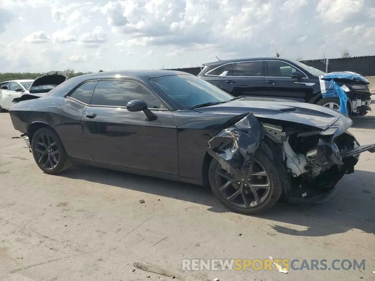 4 Photograph of a damaged car 2C3CDZAG1PH578734 DODGE CHALLENGER 2023
