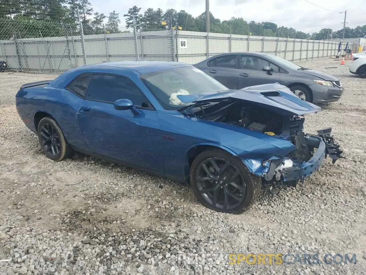 4 Photograph of a damaged car 2C3CDZAG7PH571299 DODGE CHALLENGER 2023