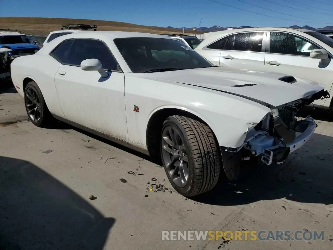 4 Photograph of a damaged car 2C3CDZFJ9PH662577 DODGE CHALLENGER 2023