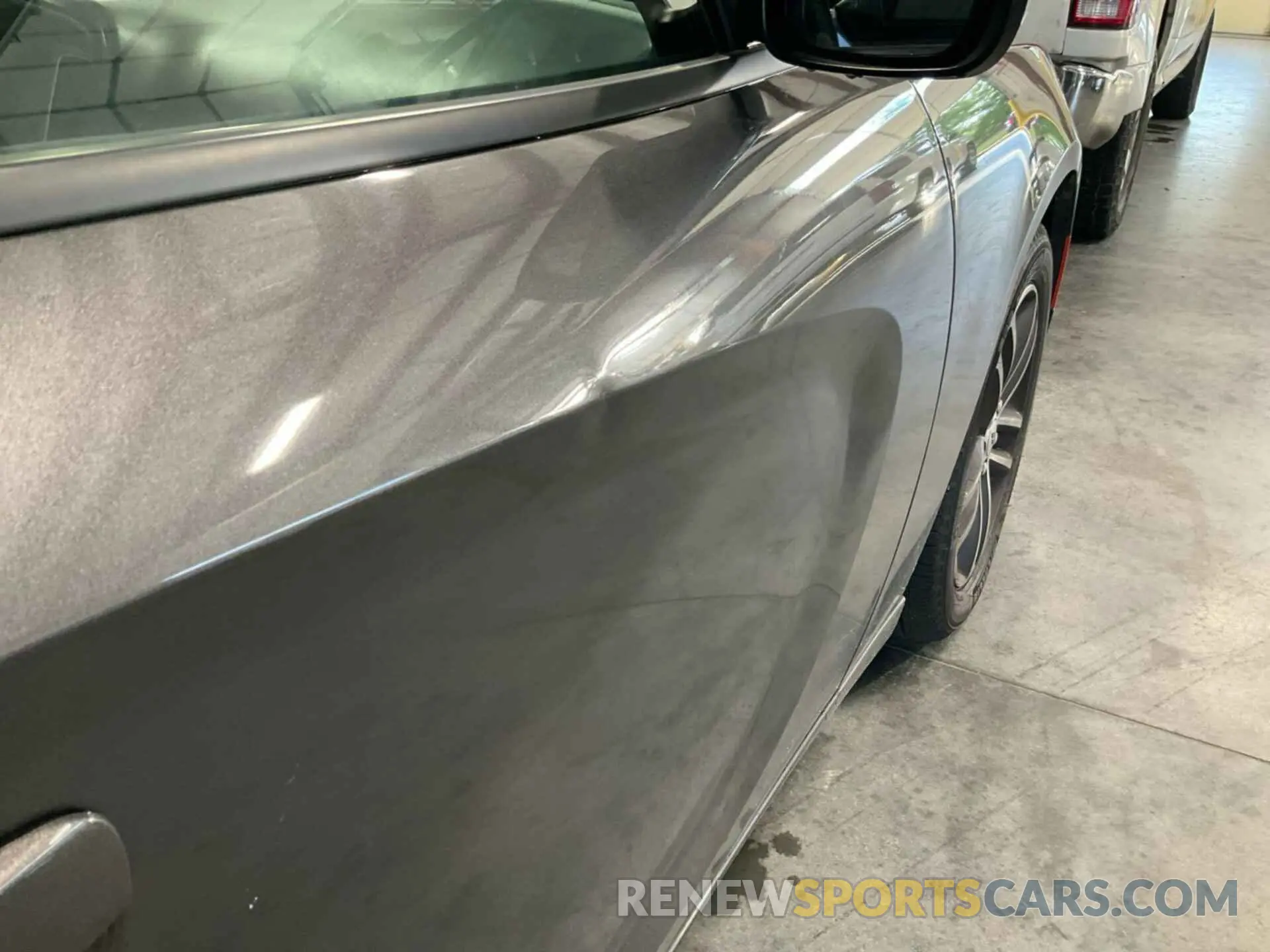 12 Photograph of a damaged car 2C3CDXJGXKH637230 DODGE CHARGER 2019