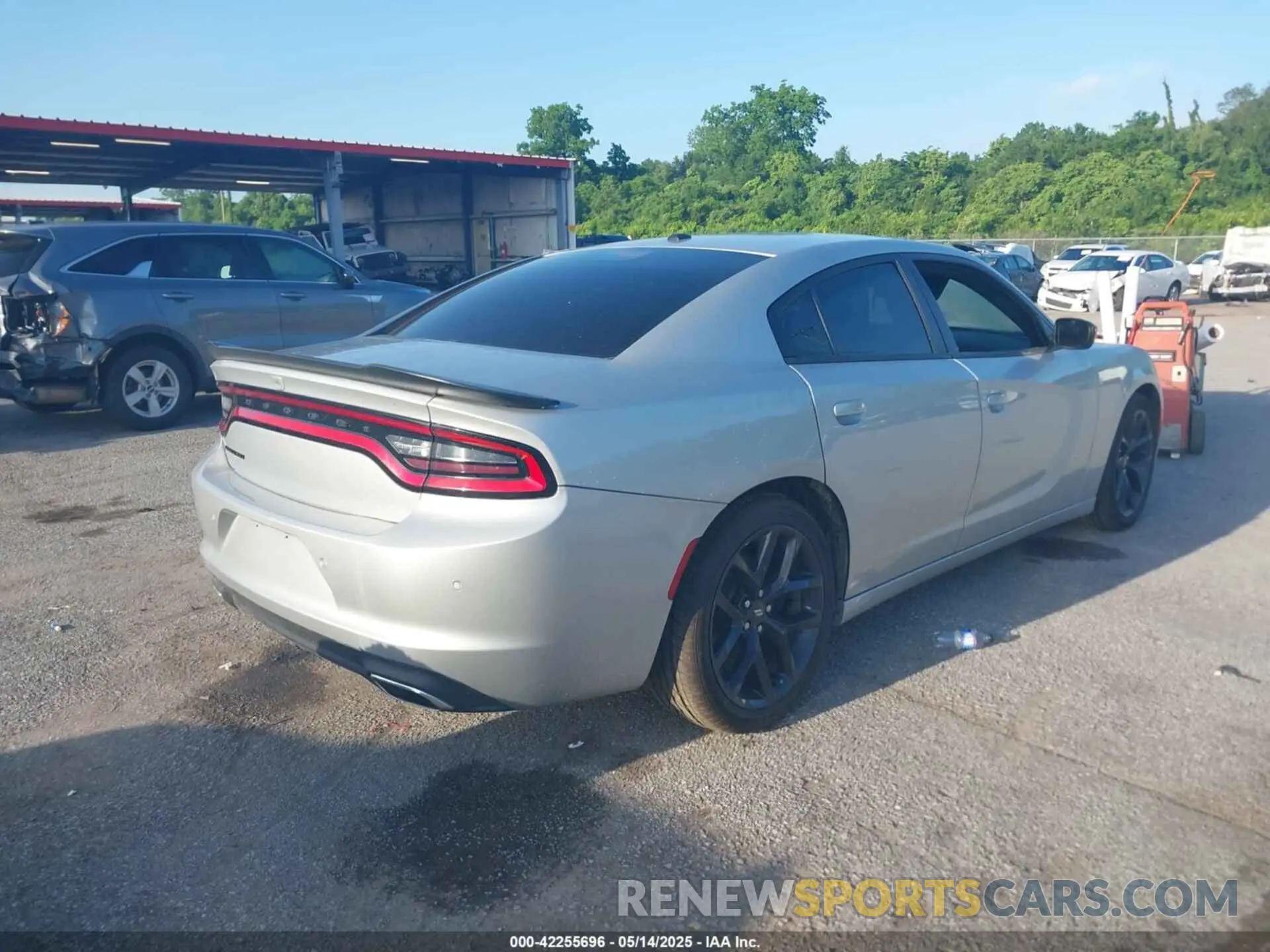 4 Photograph of a damaged car 2C3CDXBGXMH570033 DODGE CHARGER 2021
