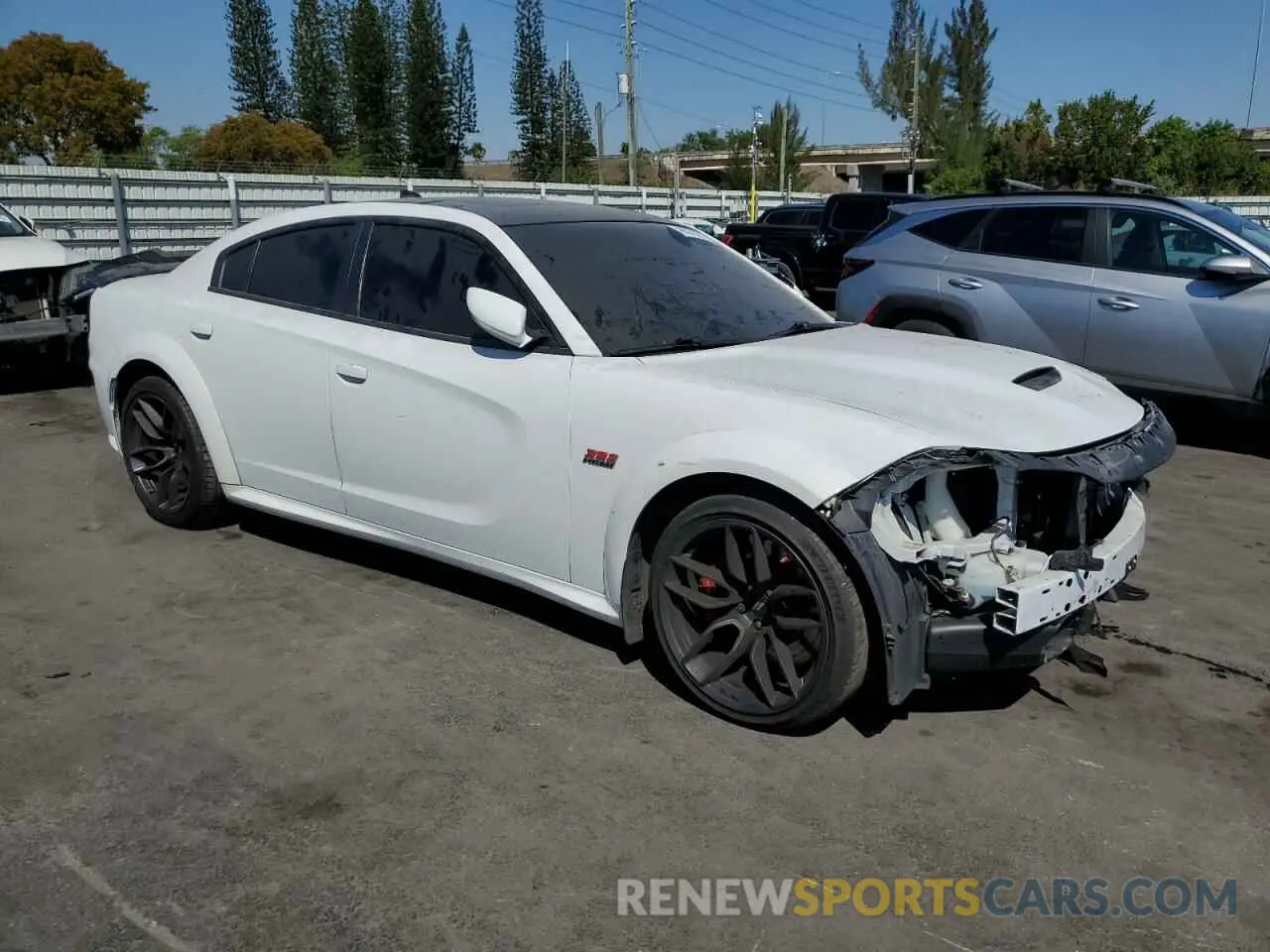 4 Photograph of a damaged car 2C3CDXGJ2MH586022 DODGE CHARGER 2021