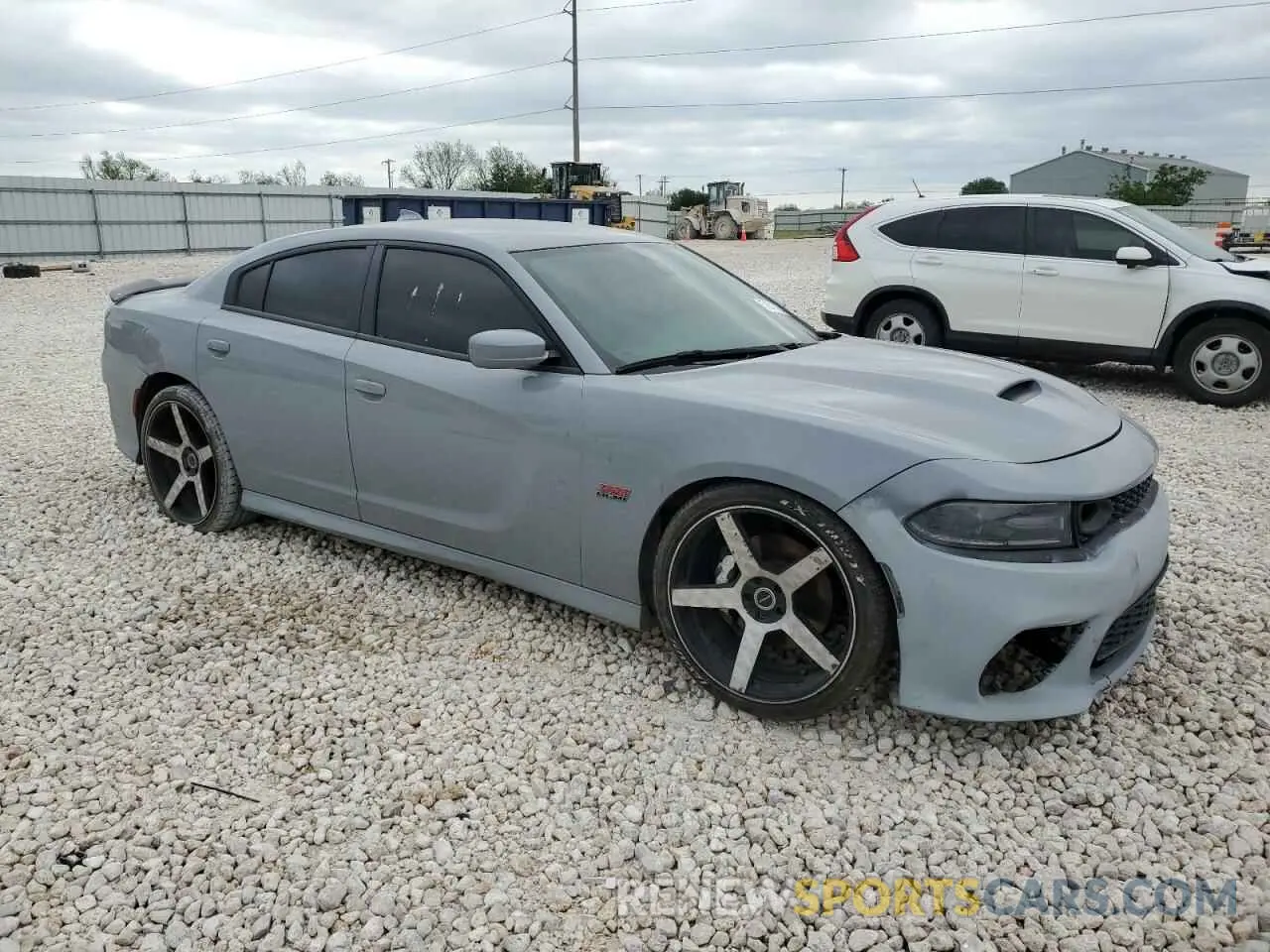 4 Photograph of a damaged car 2C3CDXGJ4MH614578 DODGE CHARGER 2021