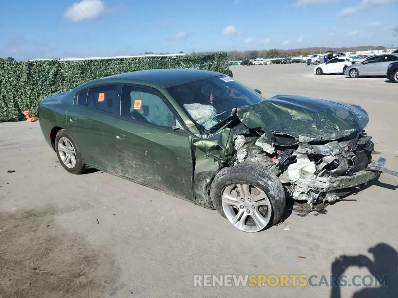 4 Photograph of a damaged car 2C3CDXBG8NH243843 DODGE CHARGER 2022