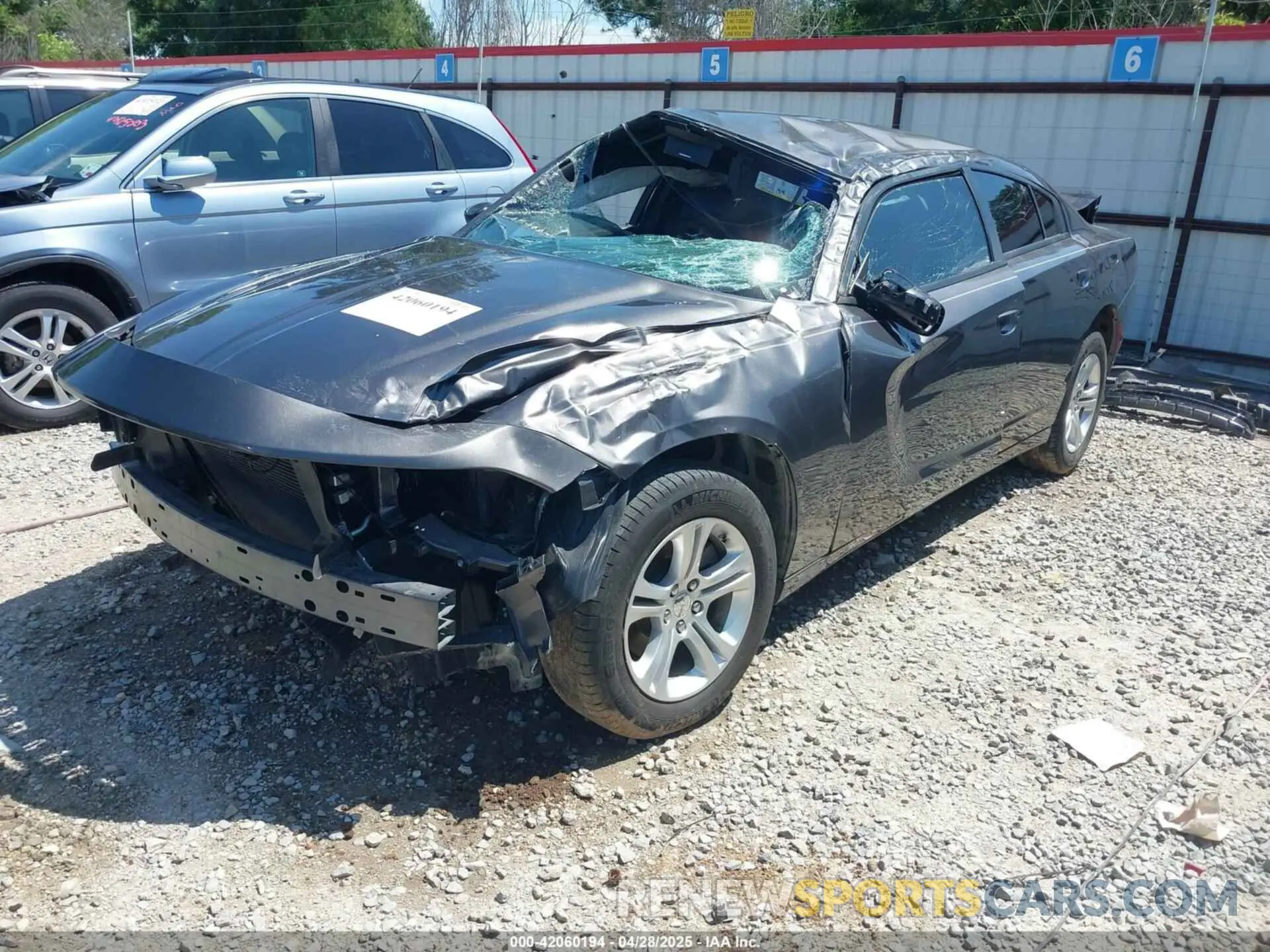 2 Photograph of a damaged car 2C3CDXBG2PH609668 DODGE CHARGER 2023