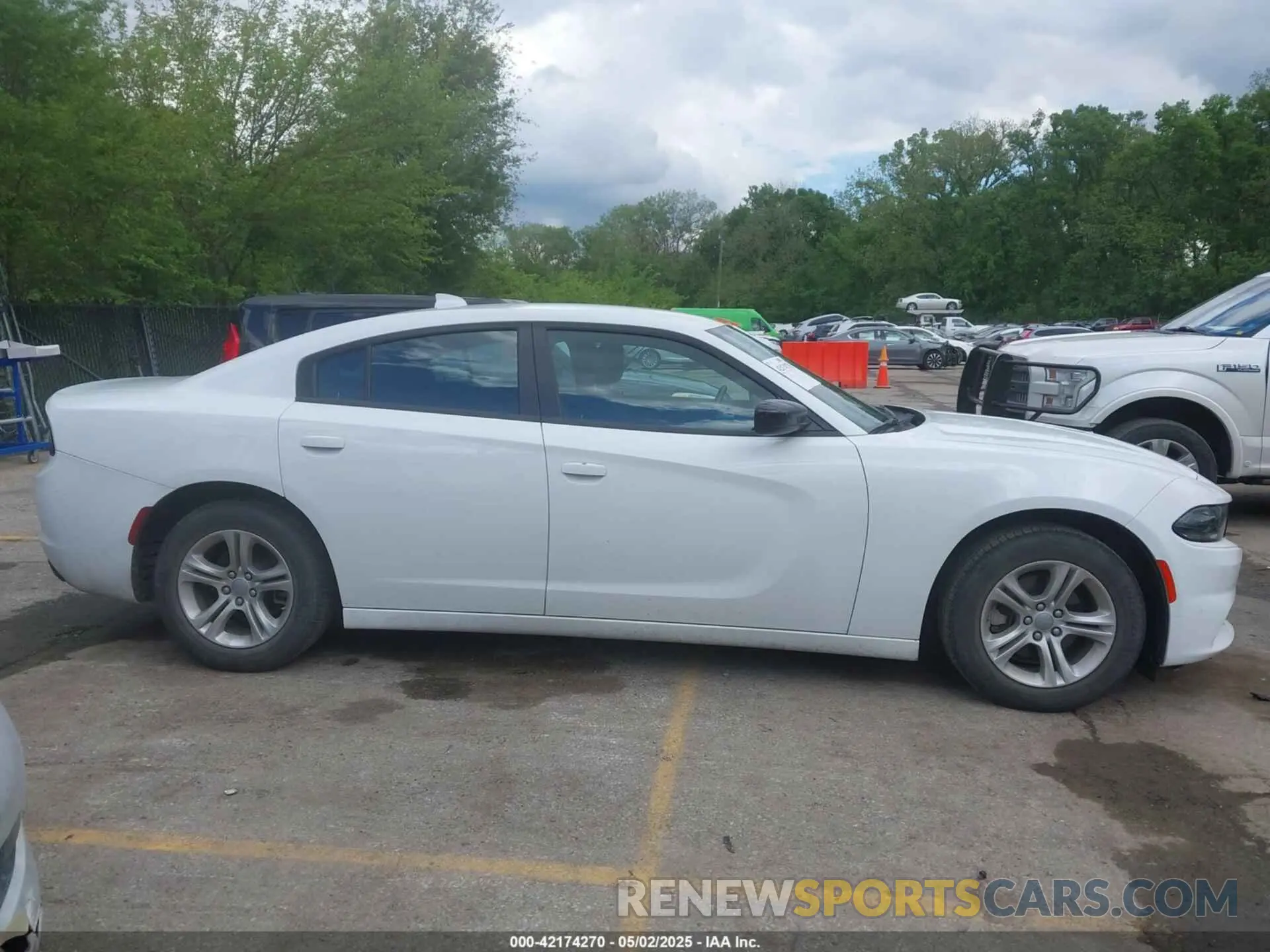 13 Photograph of a damaged car 2C3CDXBG3PH518747 DODGE CHARGER 2023
