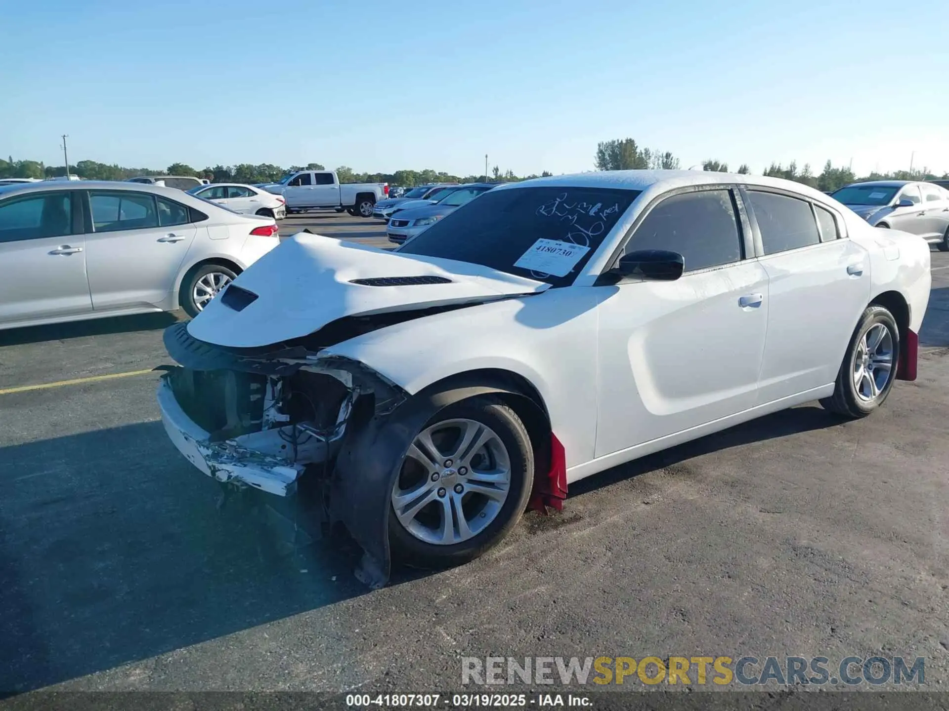 2 Photograph of a damaged car 2C3CDXBG8PH579706 DODGE CHARGER 2023