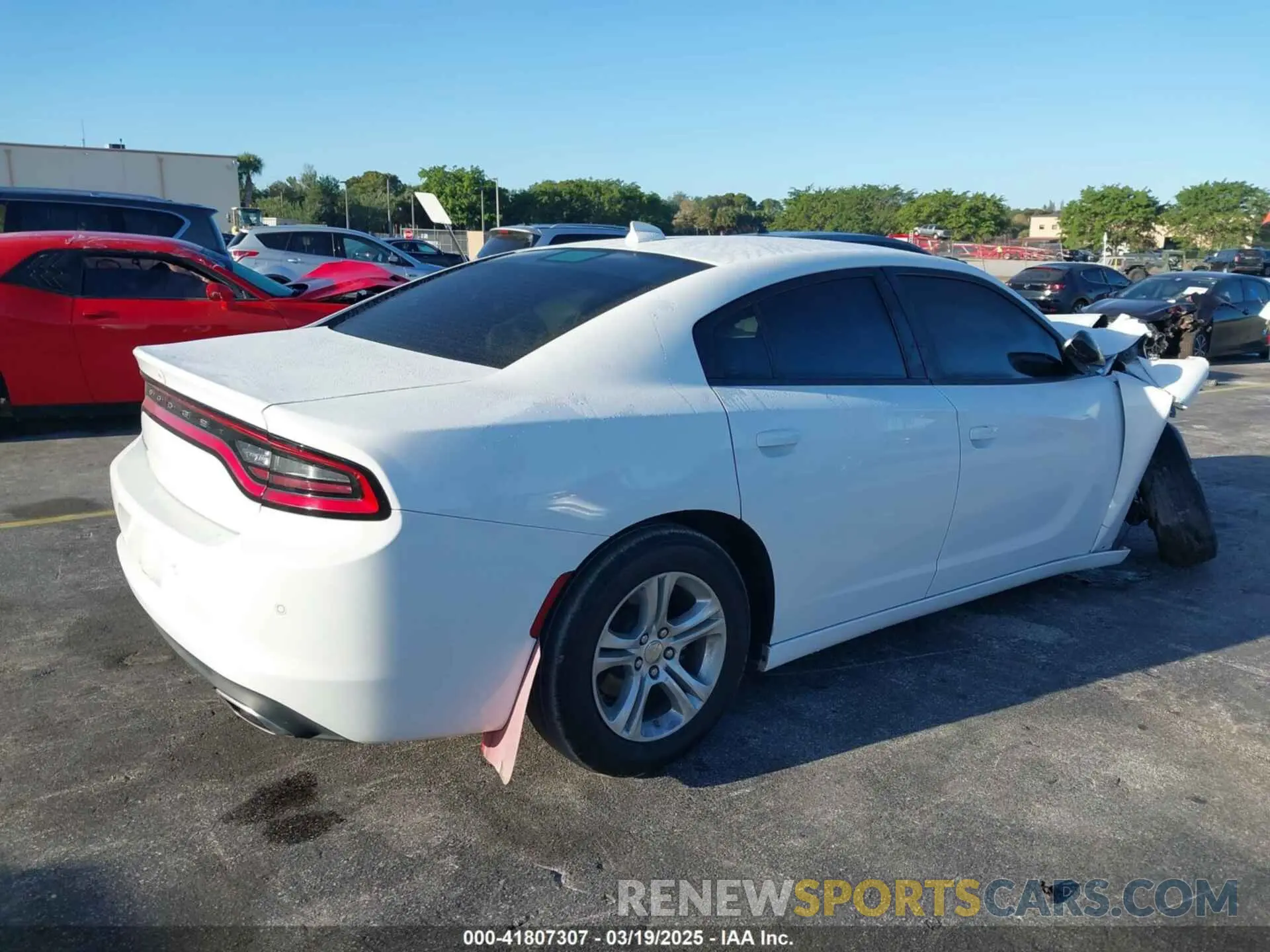 4 Photograph of a damaged car 2C3CDXBG8PH579706 DODGE CHARGER 2023
