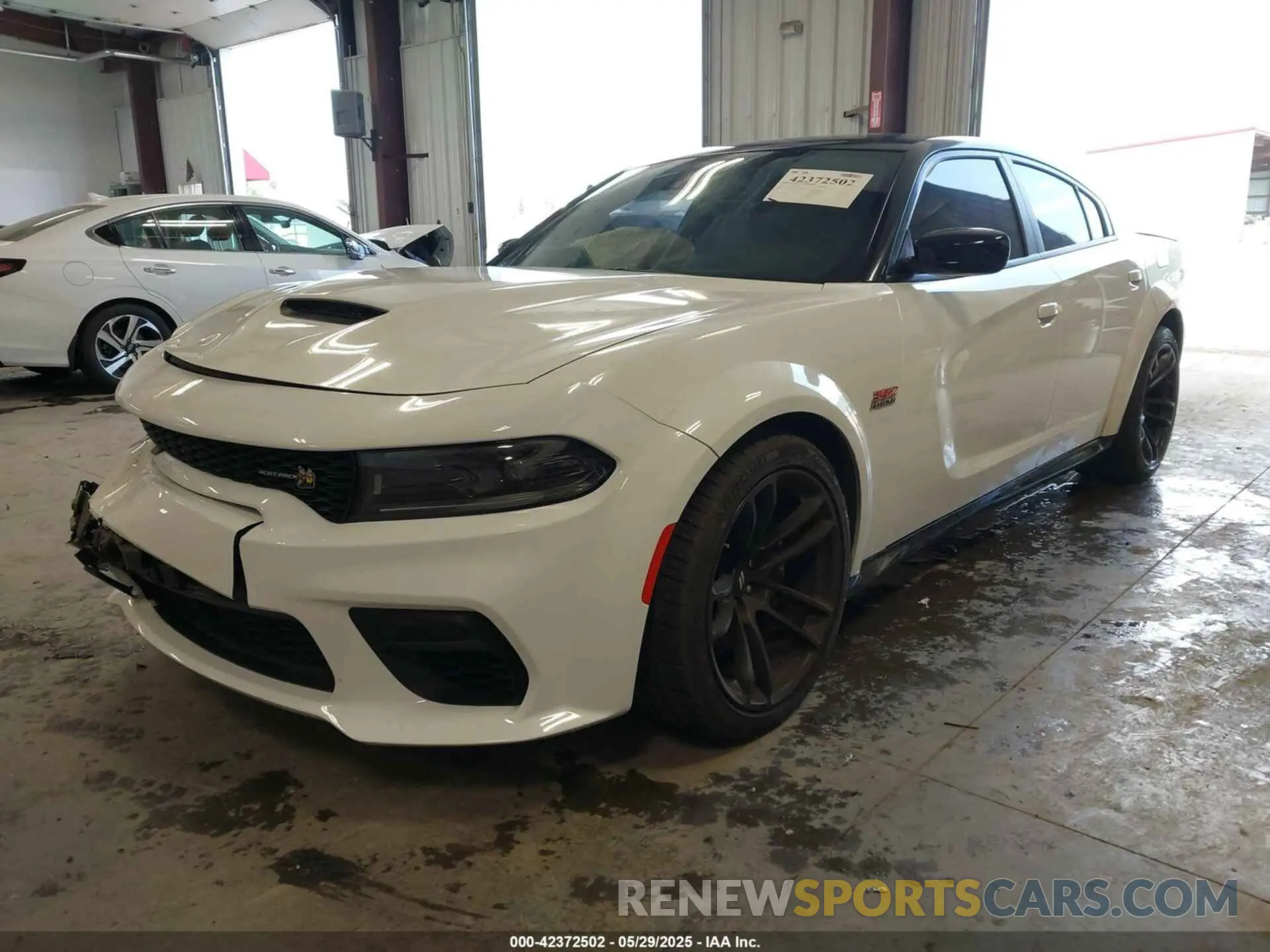 2 Photograph of a damaged car 2C3CDXGJ4PH506479 DODGE CHARGER 2023