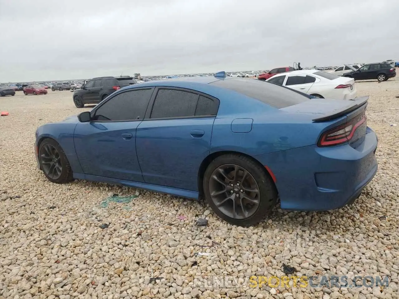 2 Photograph of a damaged car 2C3CDXGJ4PH672811 DODGE CHARGER 2023