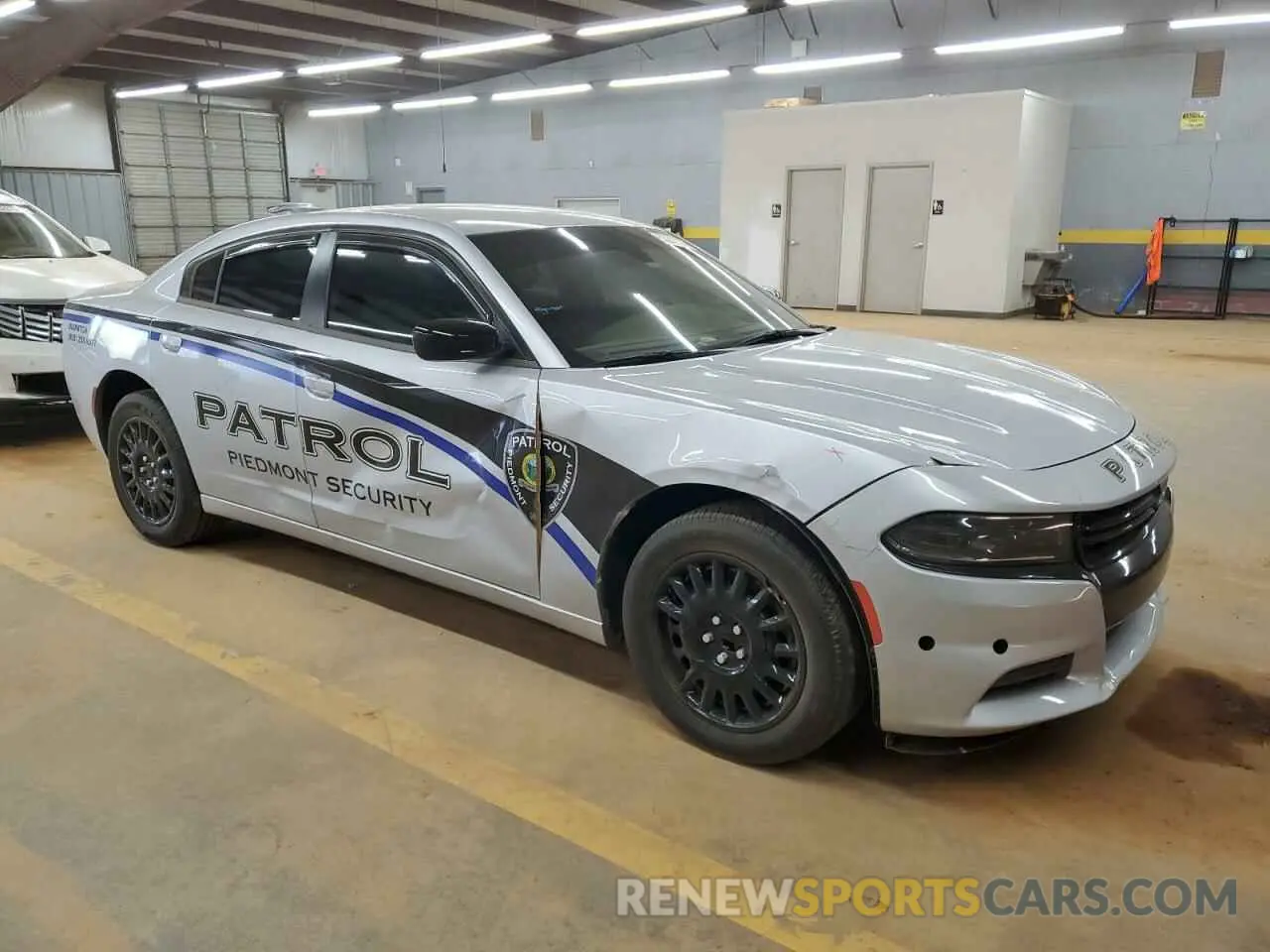 4 Photograph of a damaged car 2C3CDXKG7PH705554 DODGE CHARGER 2023