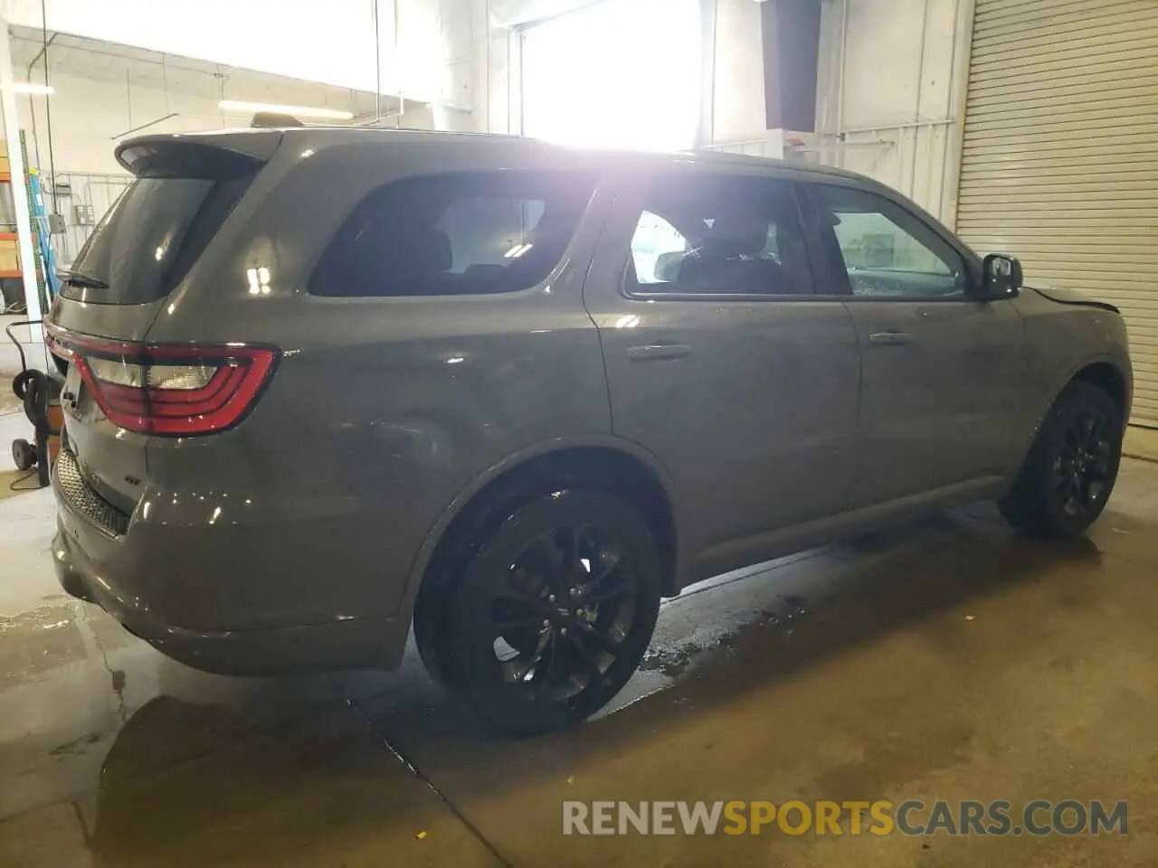 3 Photograph of a damaged car 1C4RDJDG9NC205413 DODGE DURANGO 2022