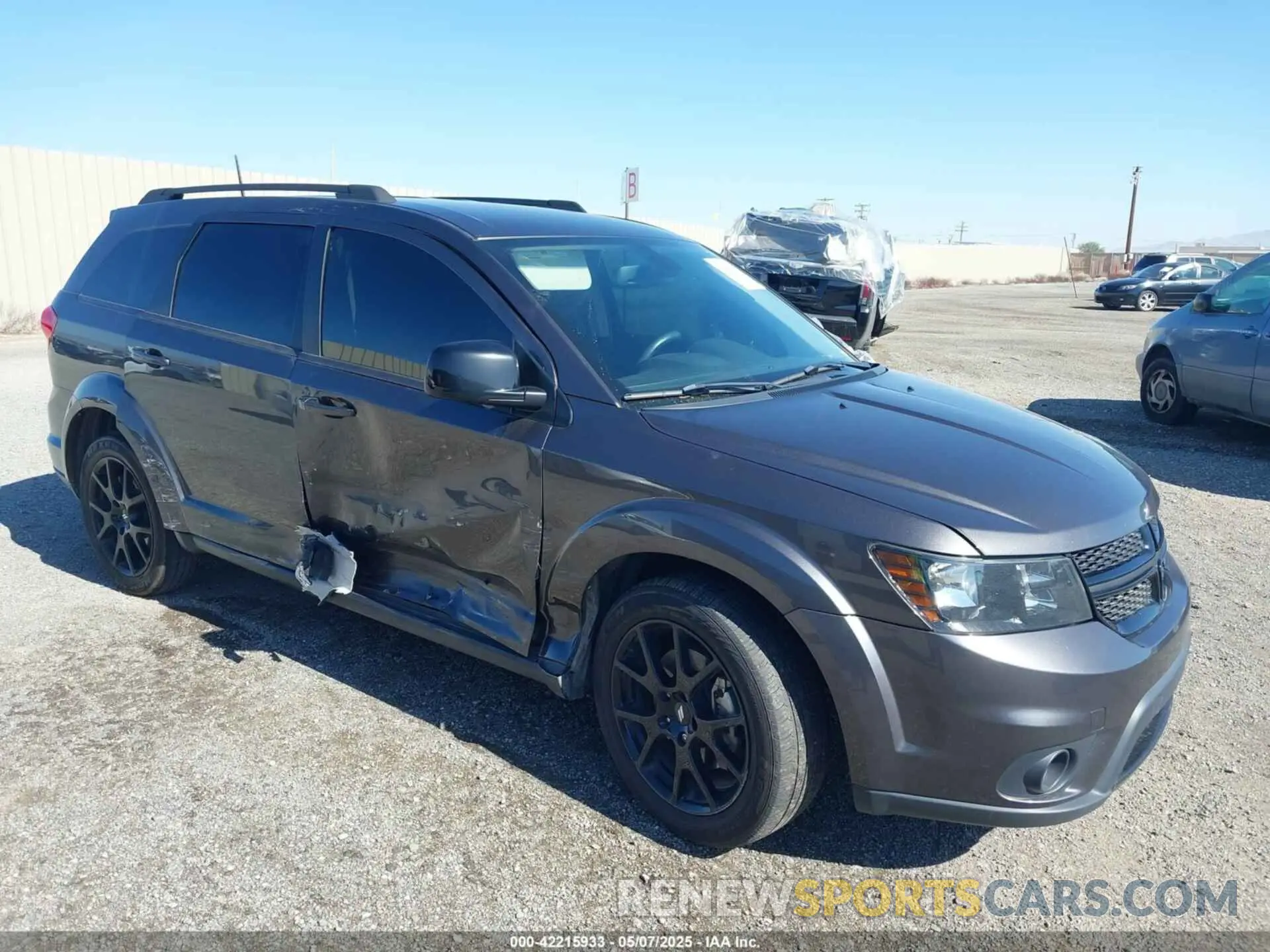 1 Photograph of a damaged car 3C4PDCBG7KT875077 DODGE JOURNEY 2019