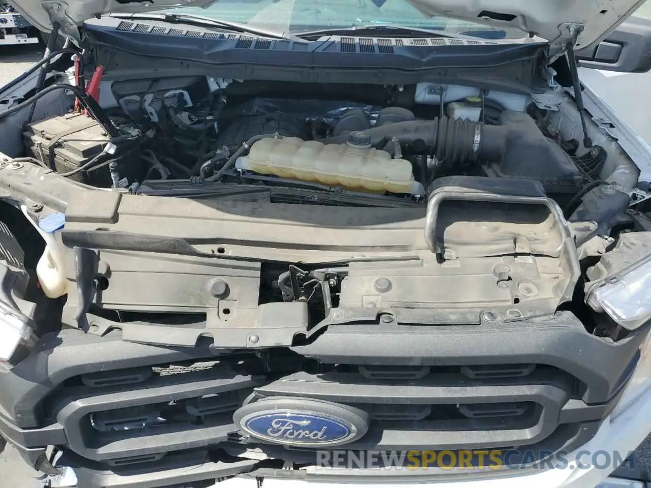 11 Photograph of a damaged car 1FTMF1CB1MKE65254 FORD All Models 2021