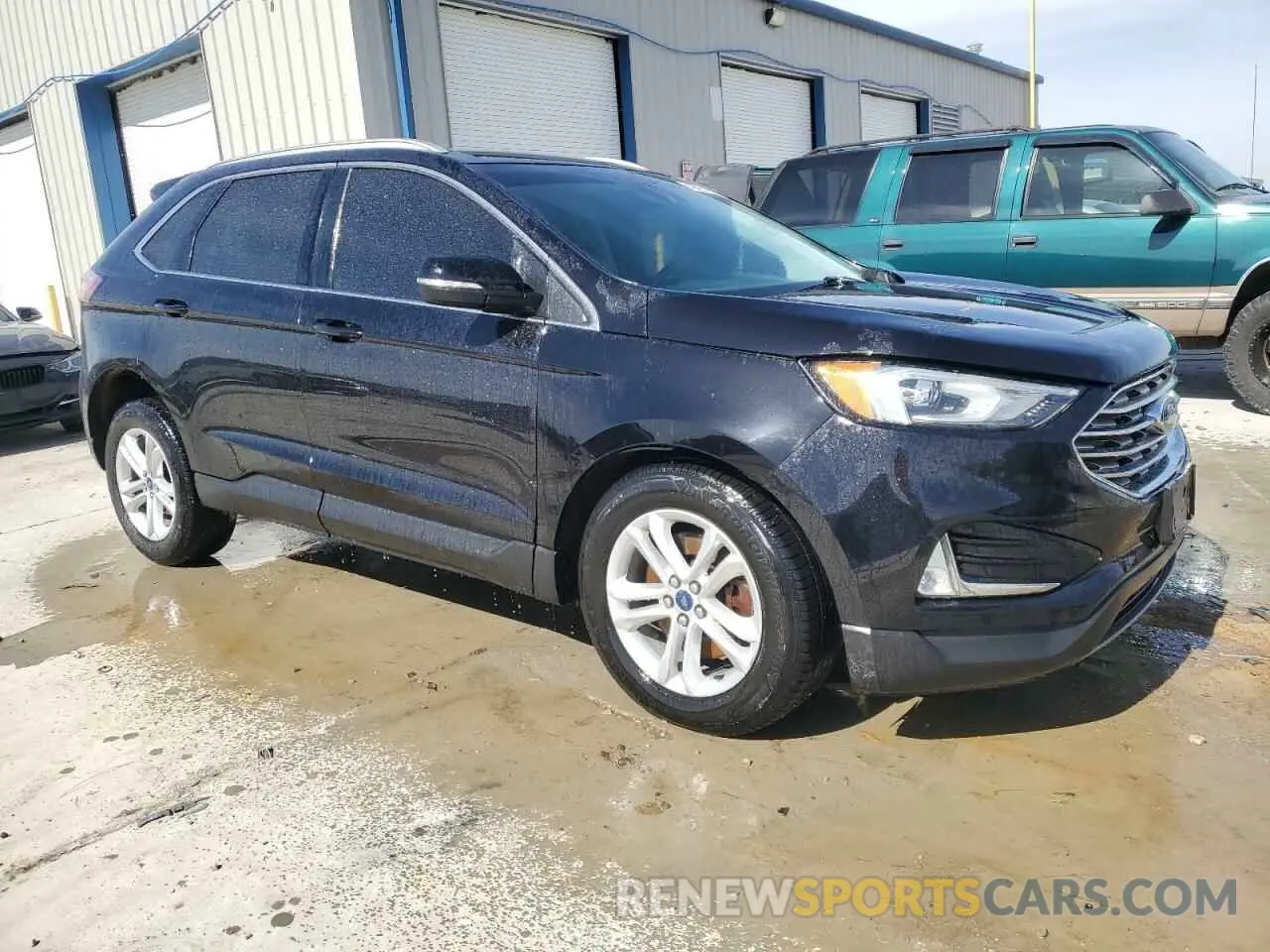 4 Фотография поврежденного автомобиля 2FMPK4J98KBB90303 FORD EDGE 2019