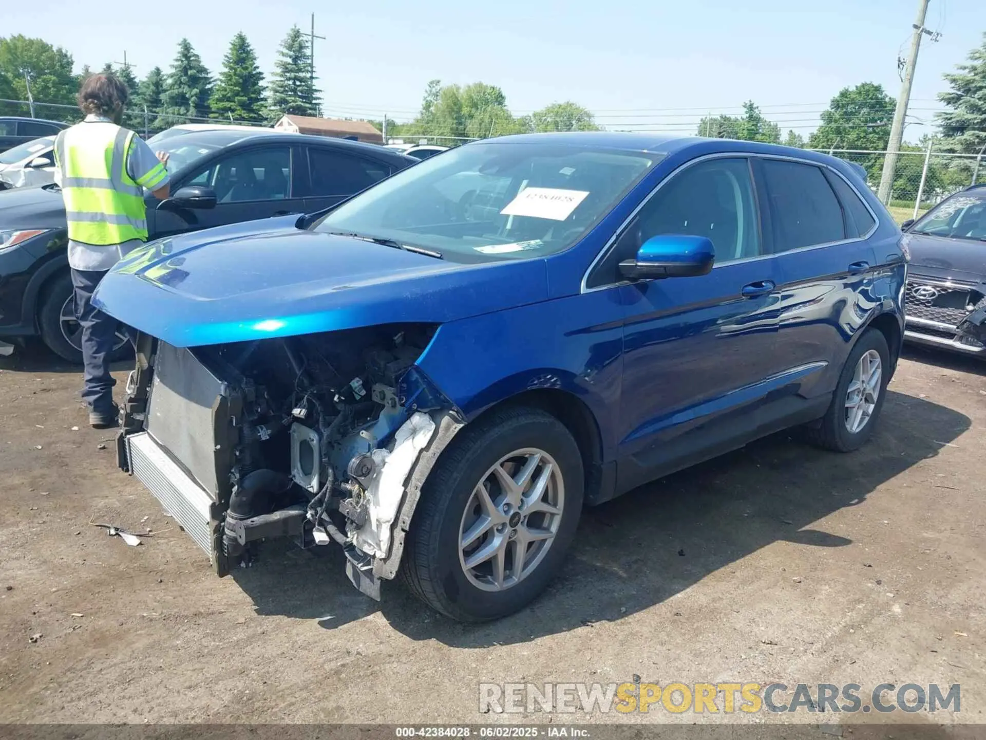 2 Фотография поврежденного автомобиля 2FMPK4J94PBA21967 FORD EDGE 2023
