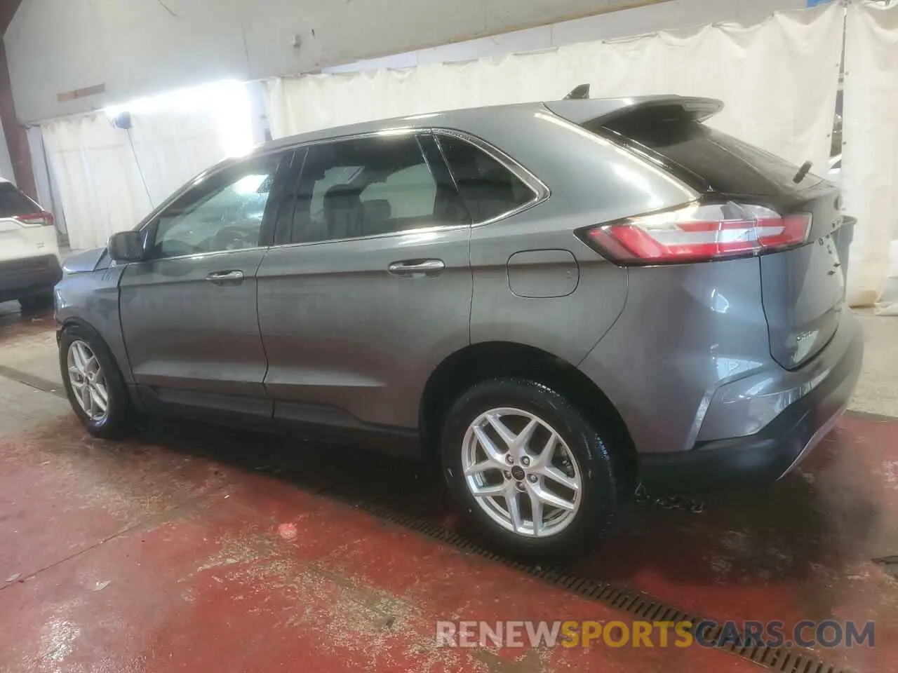 2 Фотография поврежденного автомобиля 2FMPK4J96PBA21713 FORD EDGE 2023