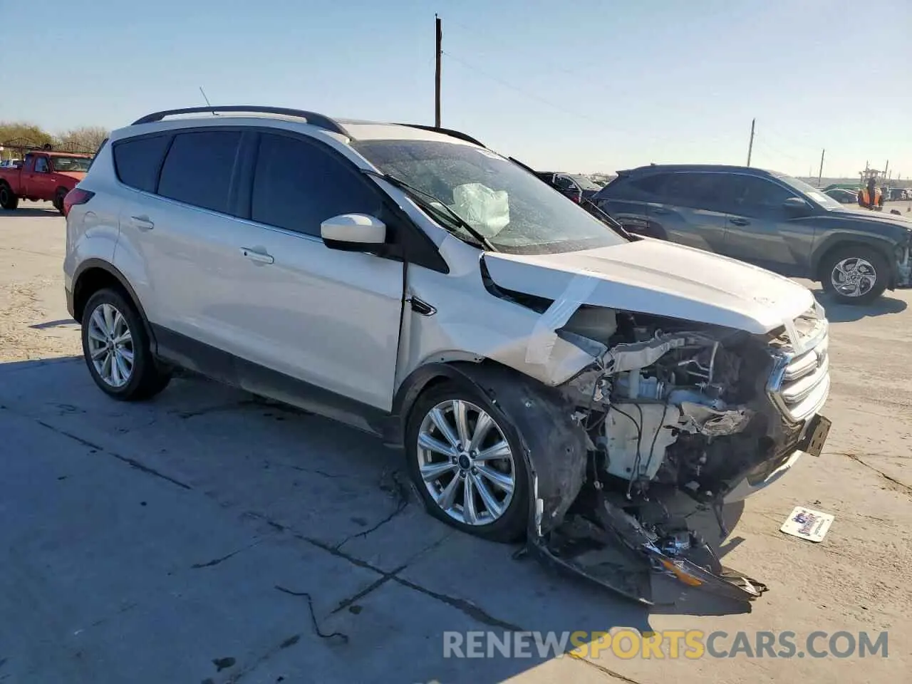 4 Photograph of a damaged car 1FMCU0HD7KUA99643 FORD ESCAPE 2019