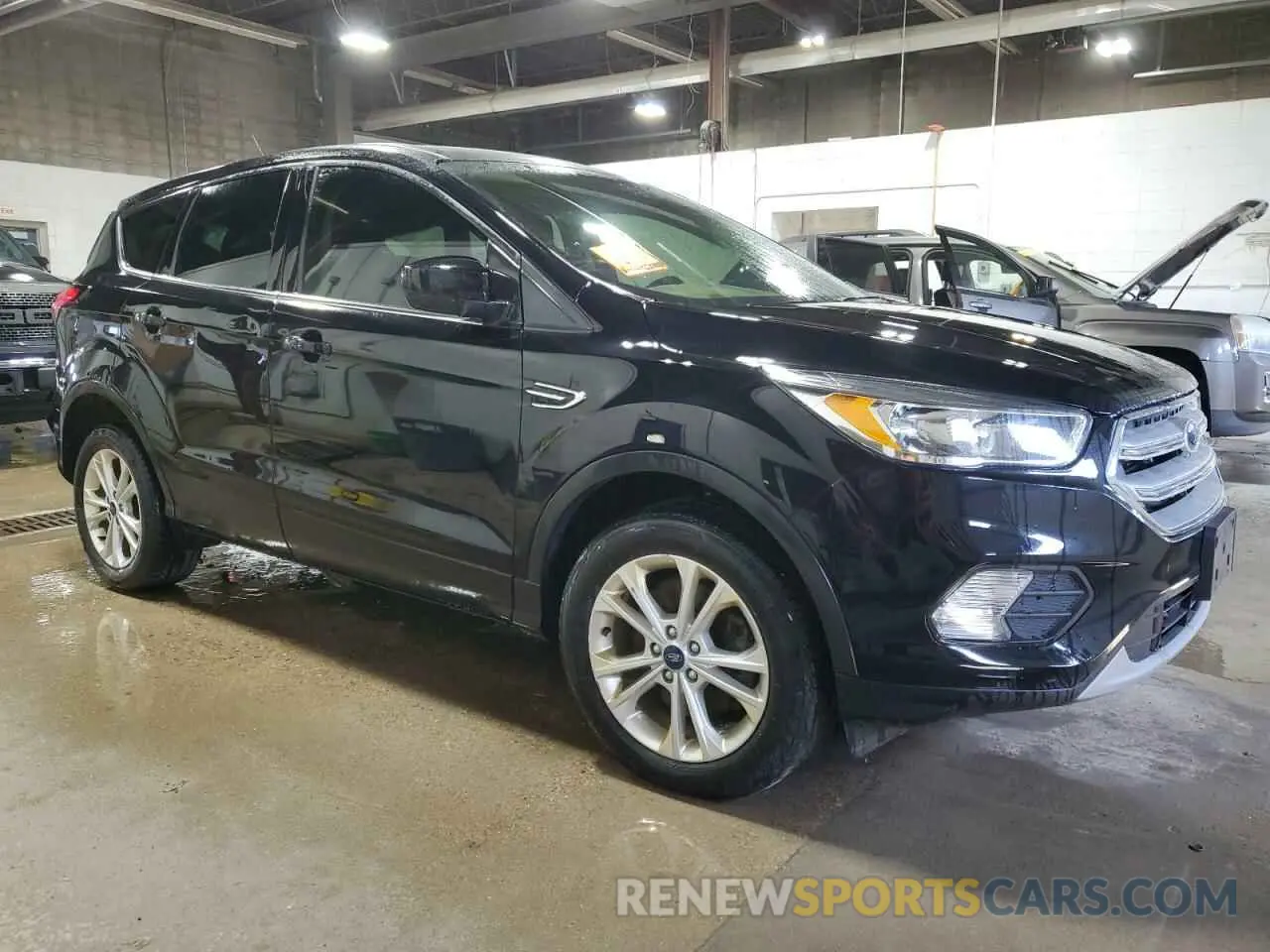4 Photograph of a damaged car 1FMCU9GD0KUA70135 FORD ESCAPE 2019