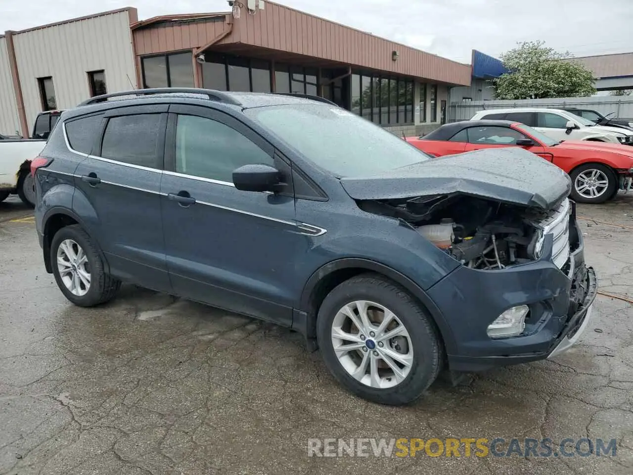 4 Фотография поврежденного автомобиля 1FMCU9H92KUB73230 FORD ESCAPE 2019