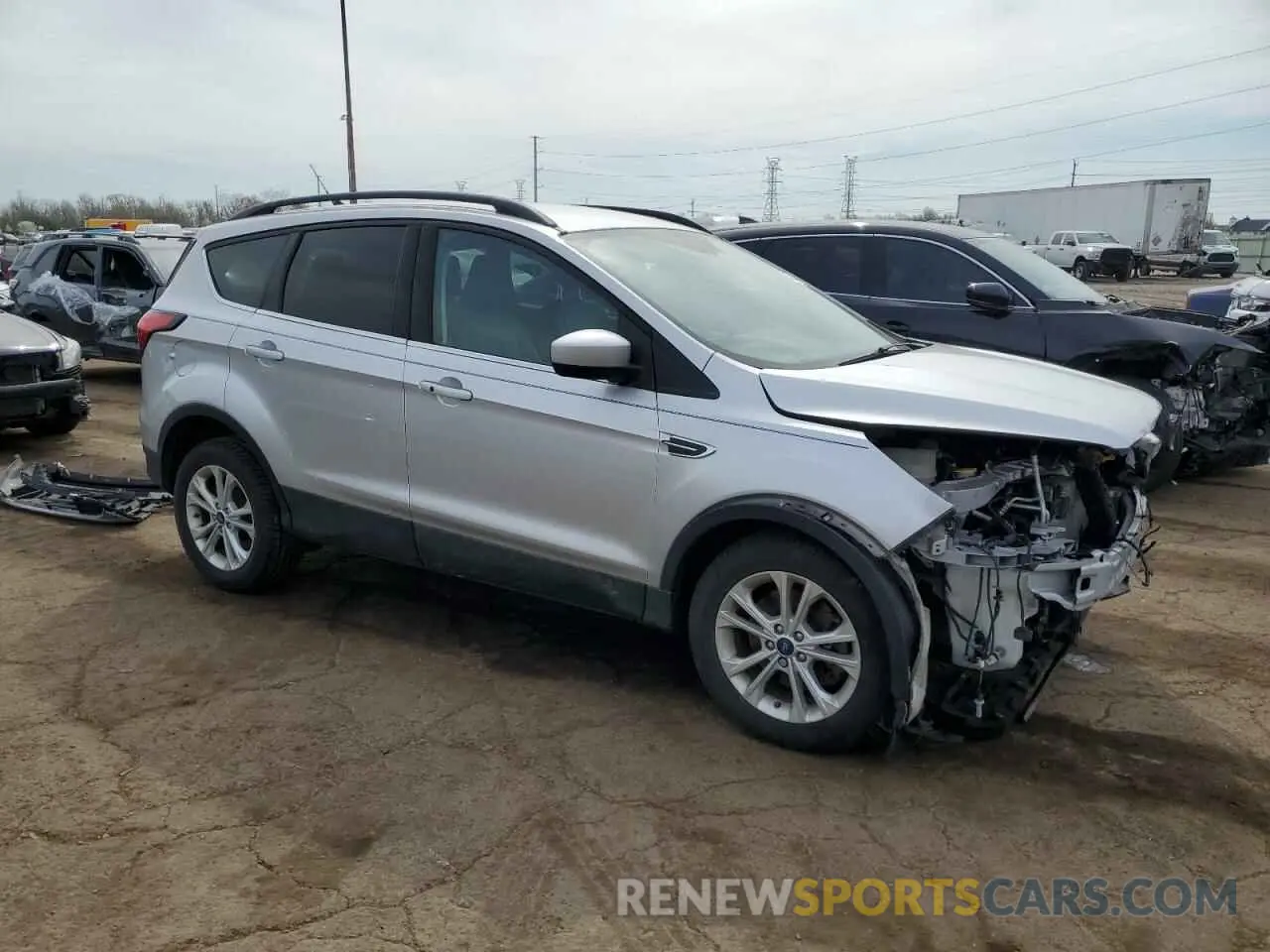 4 Photograph of a damaged car 1FMCU9HD7KUC24144 FORD ESCAPE 2019