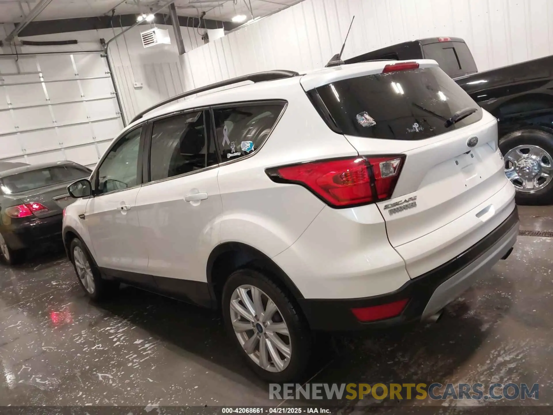 14 Фотография поврежденного автомобиля 1FMCU9HD9KUA18646 FORD ESCAPE 2019