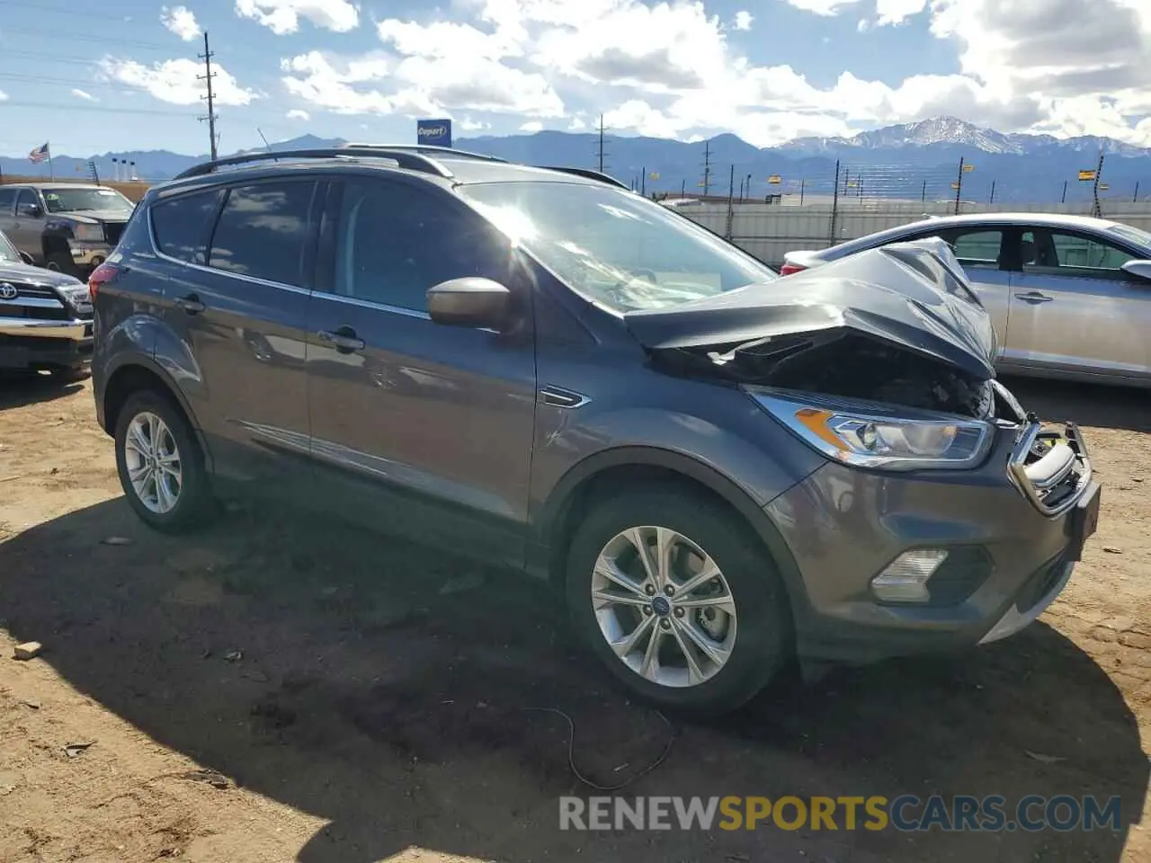 4 Photograph of a damaged car 1FMCU9HD9KUB62231 FORD ESCAPE 2019