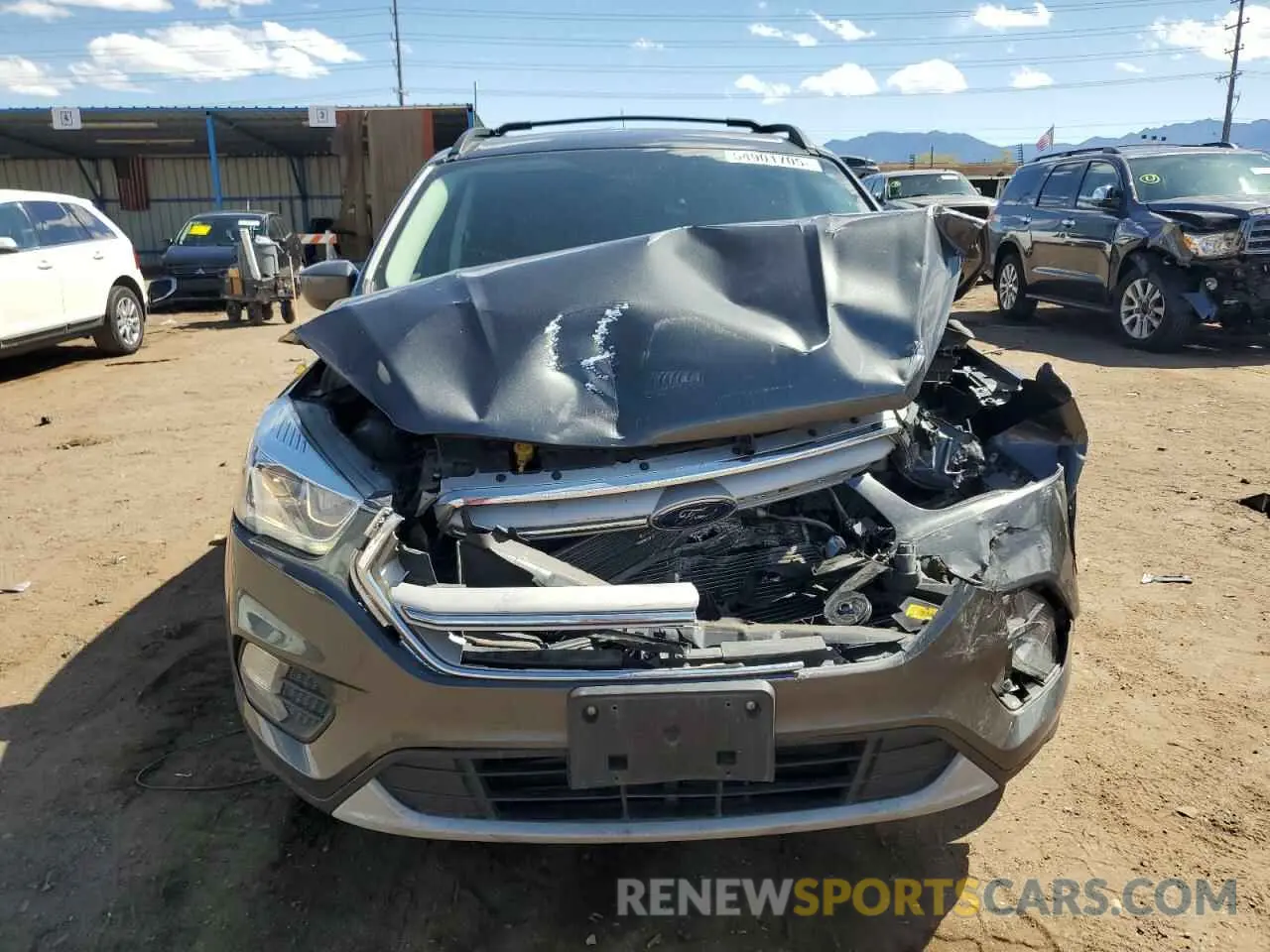5 Photograph of a damaged car 1FMCU9HD9KUB62231 FORD ESCAPE 2019
