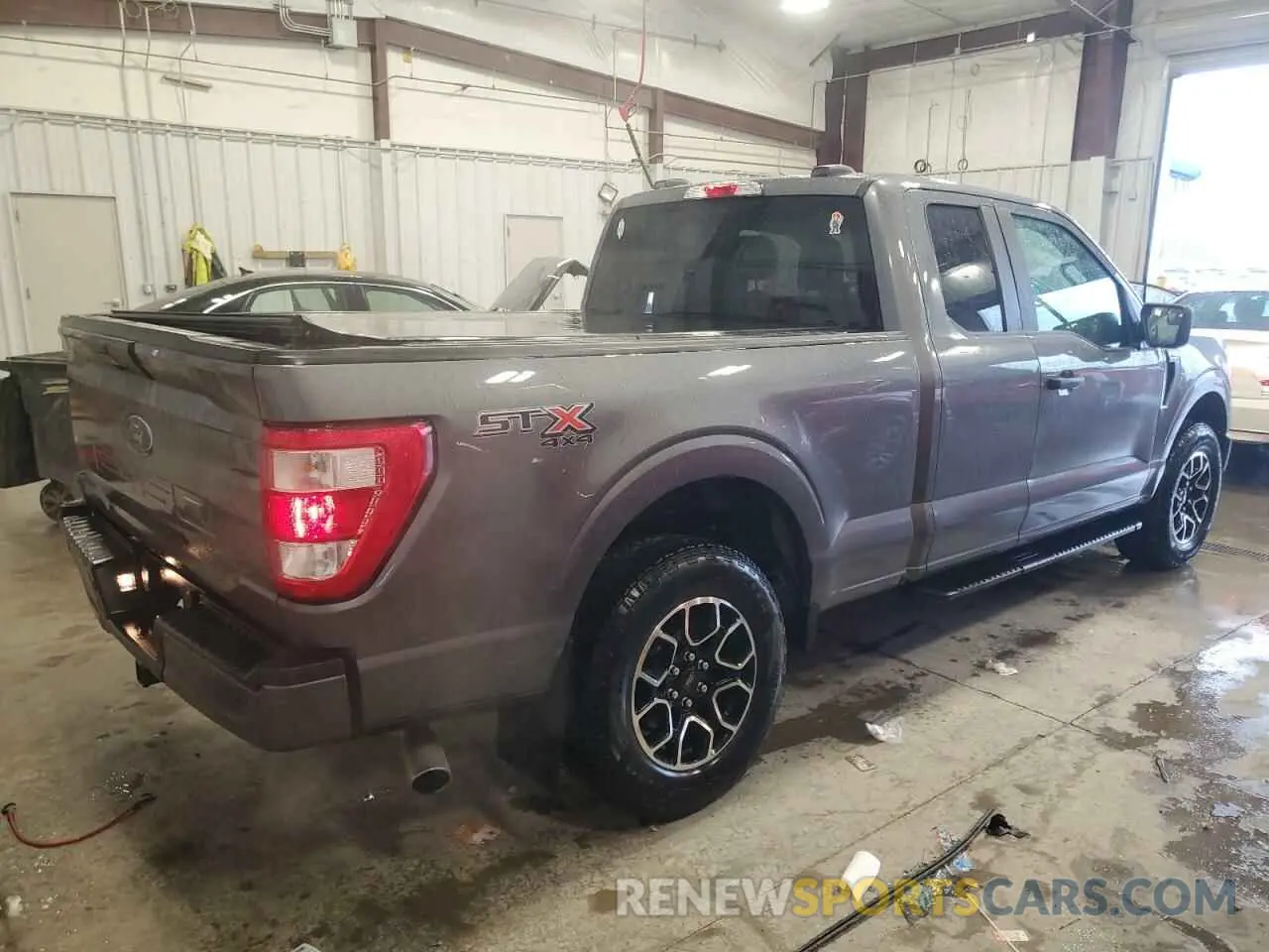 3 Photograph of a damaged car 1FTFX1E51NFA24893 FORD F-150 2022