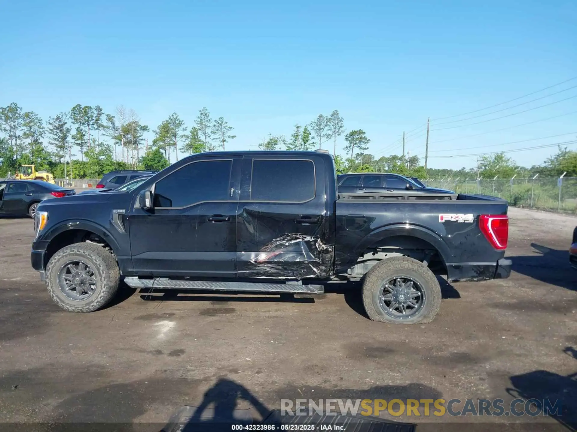 14 Photograph of a damaged car 1FTFW1E56PFB54061 FORD F-150 2023