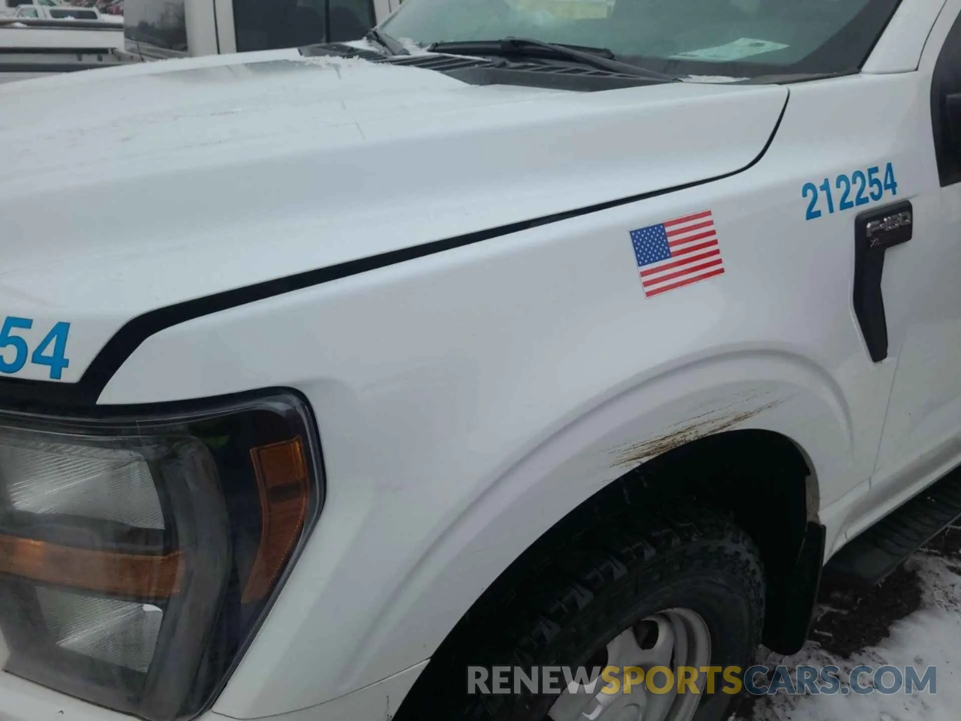 12 Photograph of a damaged car 1FTFW1E57PFB23417 FORD F-150 2023