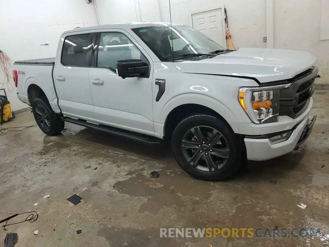 4 Photograph of a damaged car 1FTFW1E58PFB59584 FORD F-150 2023