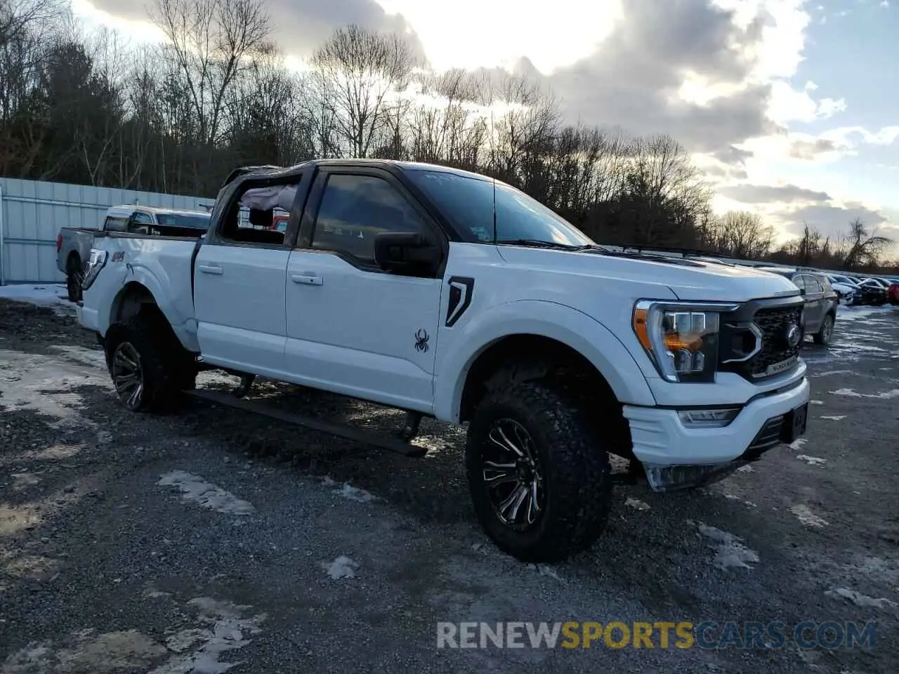 4 Photograph of a damaged car 1FTFW1E59PFA31919 FORD F-150 2023