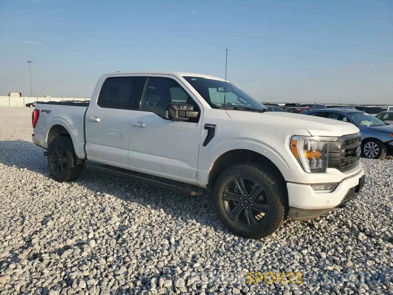 4 Photograph of a damaged car 1FTFW1E87PKD27930 FORD F-150 2023