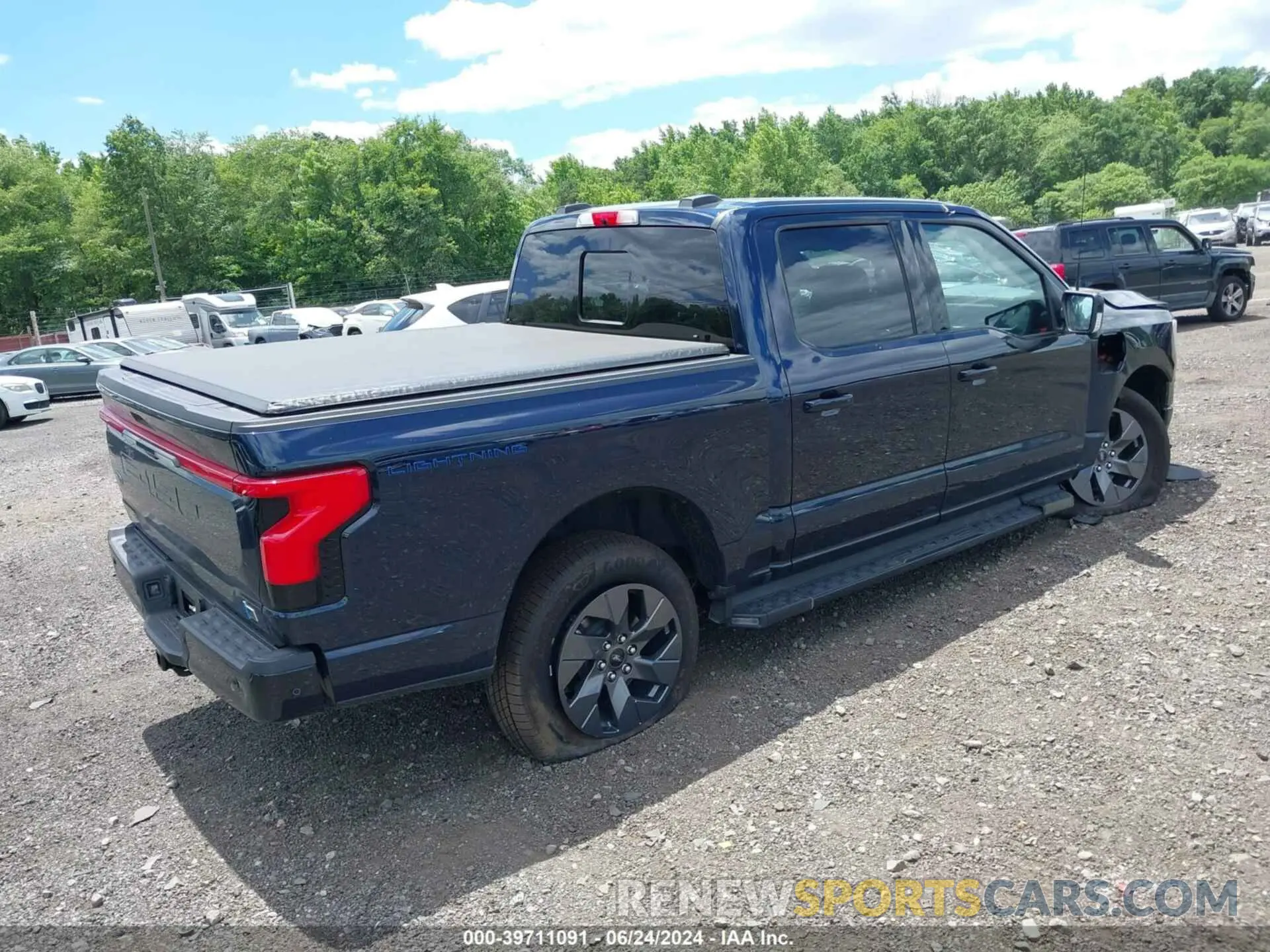 4 Photograph of a damaged car 1FT6W1EVXPWG42428 FORD F-150 LIGHTNING 2023