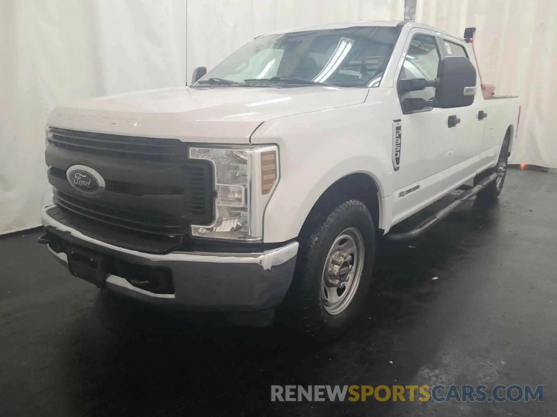 26 Photograph of a damaged car 1FT7W3AT3KEF23218 FORD F350 2019