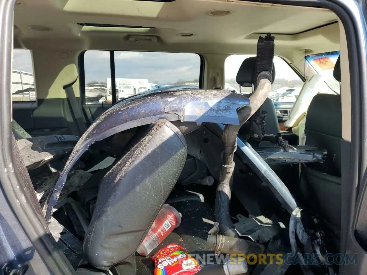 11 Фотография поврежденного автомобиля 2FMGK5D82KBA08801 FORD FLEX 2019