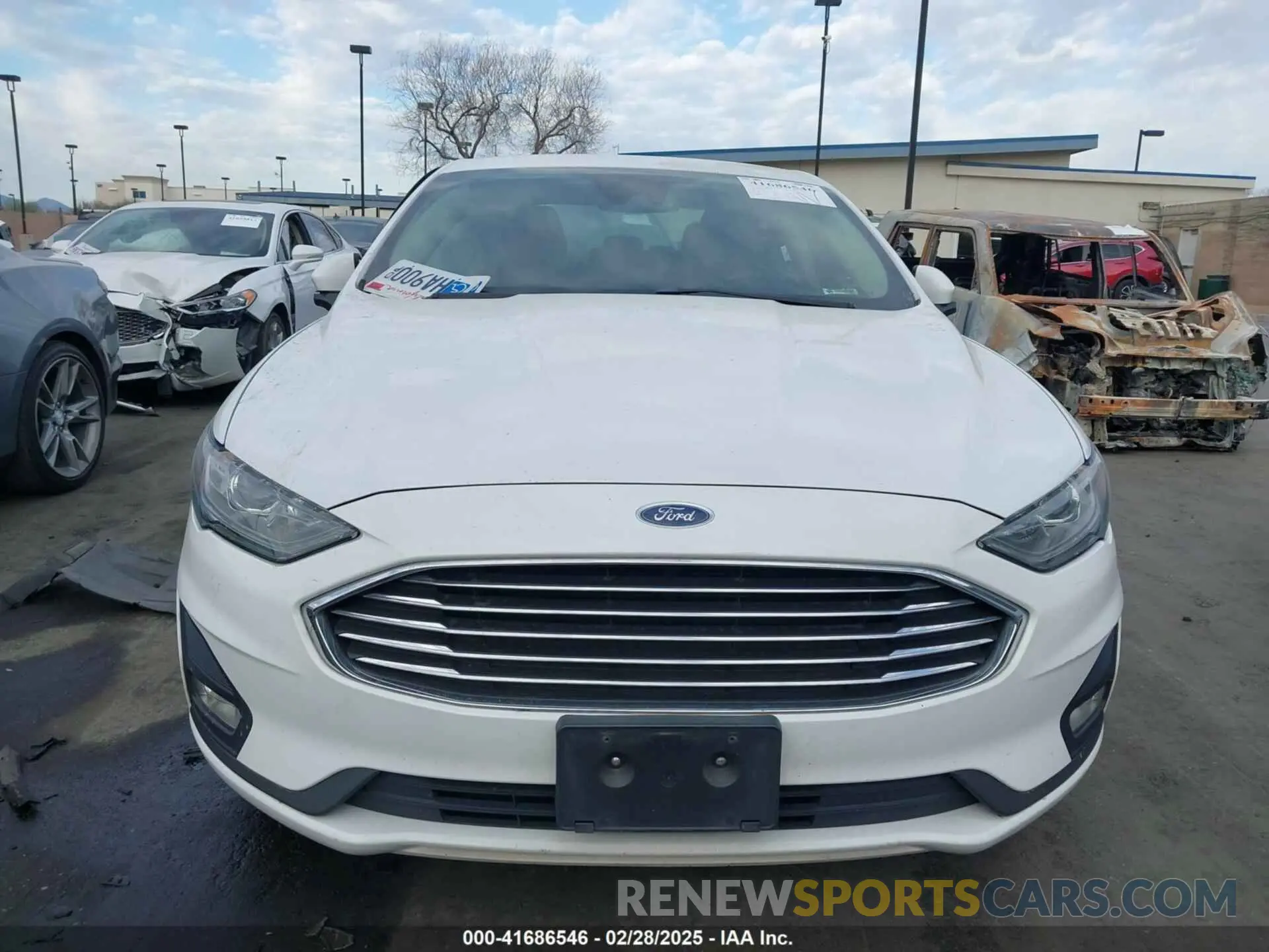 12 Фотография поврежденного автомобиля 3FA6P0HD7KR200699 FORD FUSION 2019