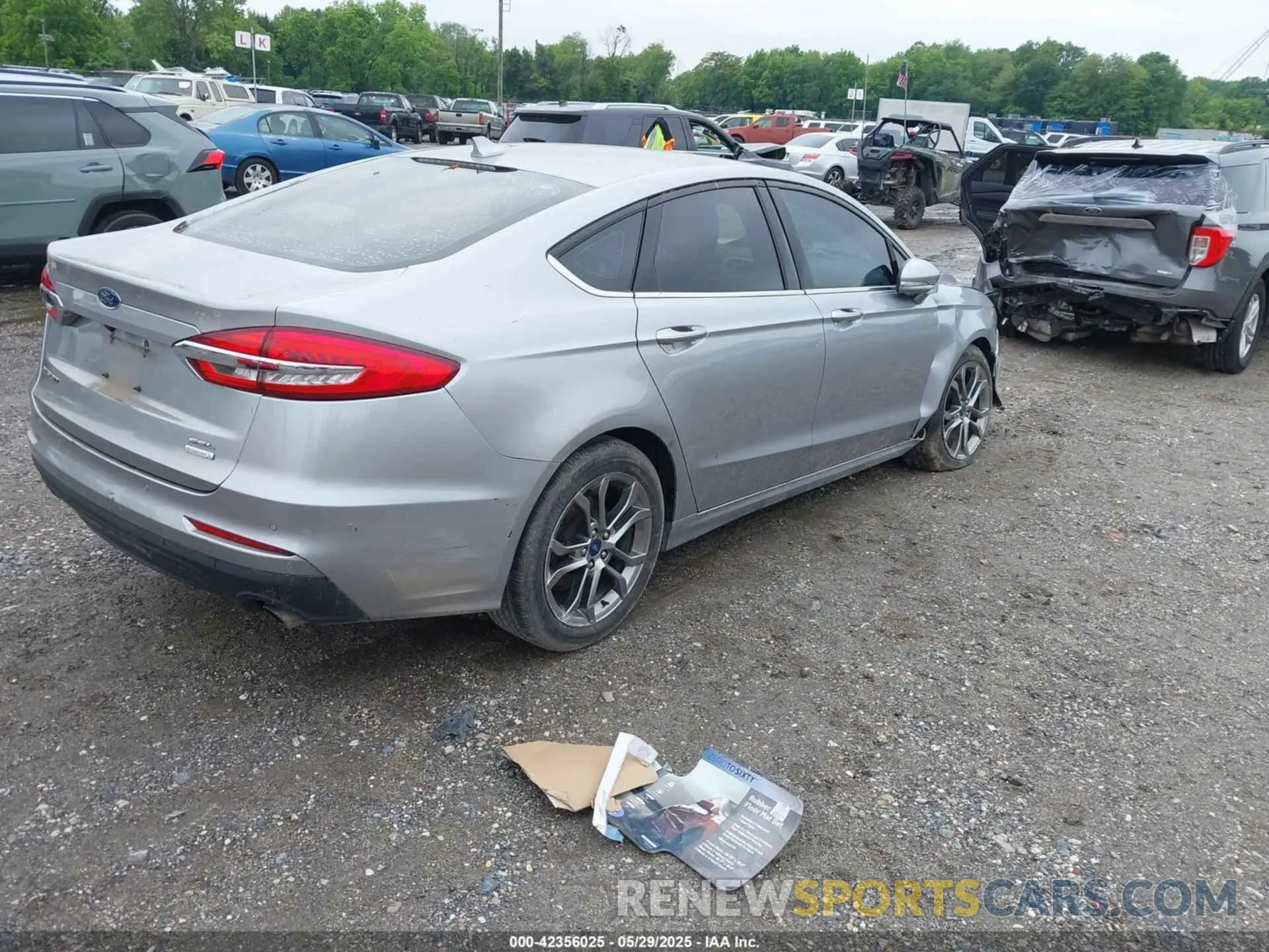 4 Фотография поврежденного автомобиля 3FA6P0CD6LR130394 FORD FUSION 2020