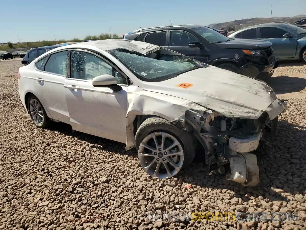 4 Фотография поврежденного автомобиля 3FA6P0LU8LR259611 FORD FUSION 2020